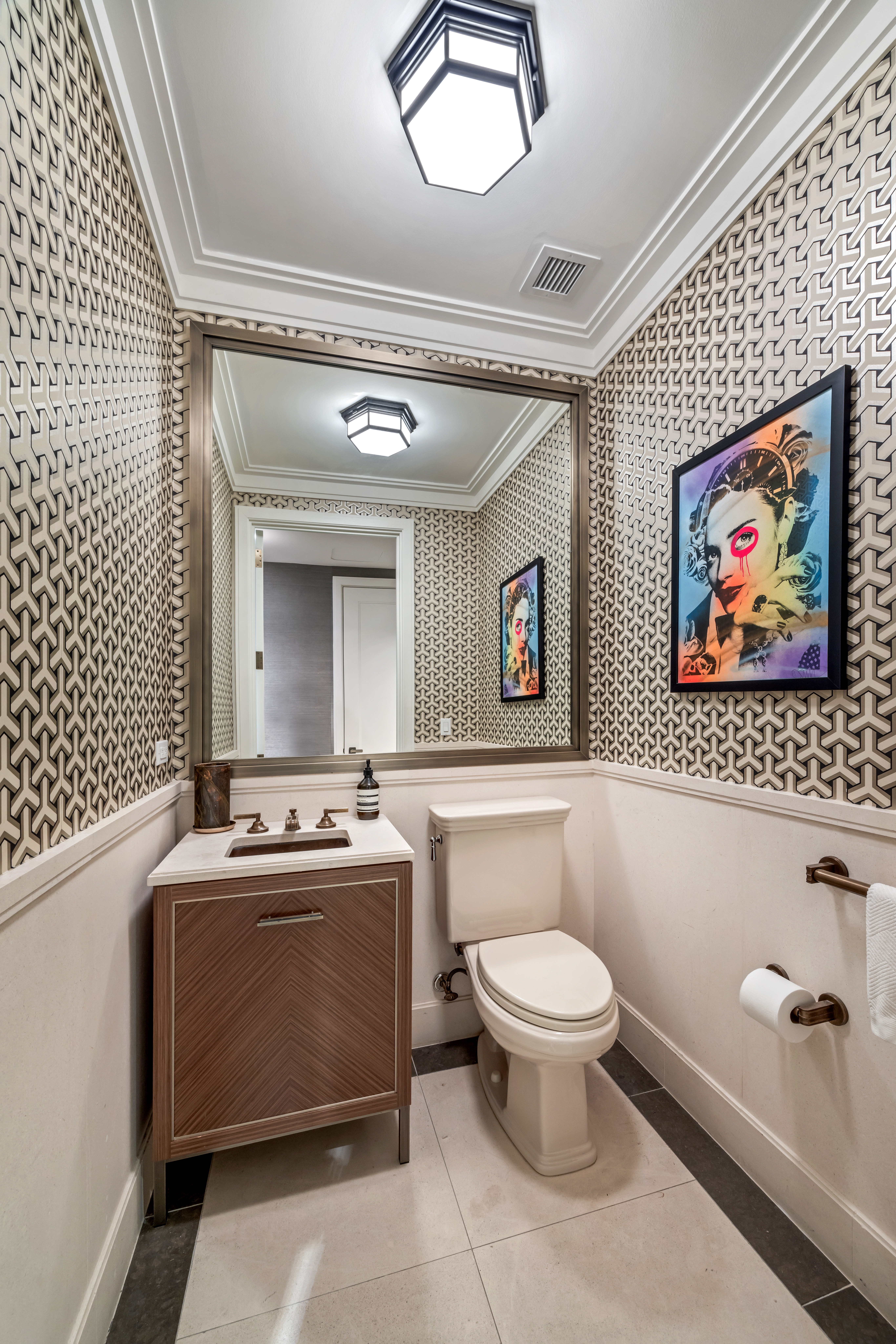 100 Barclay Street, Unit 13G Manhattan, NY 10007 - Photo 12 of 26 a bathroom with a toilet a sink and mirror