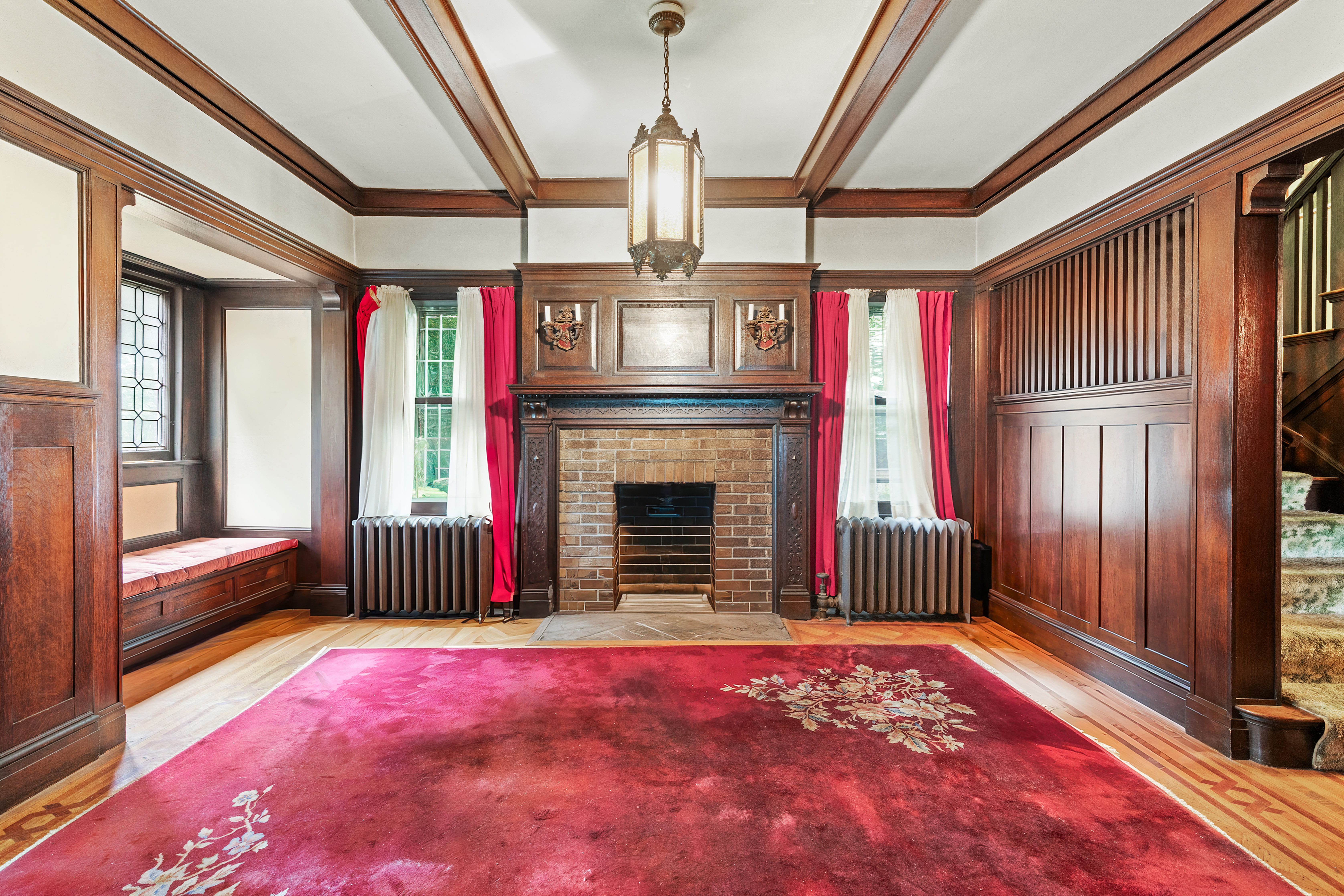 1917 Ditmas Avenue Brooklyn, NY 11226 - Photo 4 of 13 a spacious bedroom with a bed and a fireplace