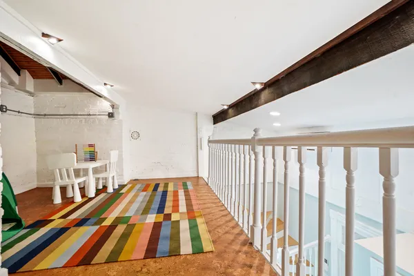 a view of a living room with a patio
