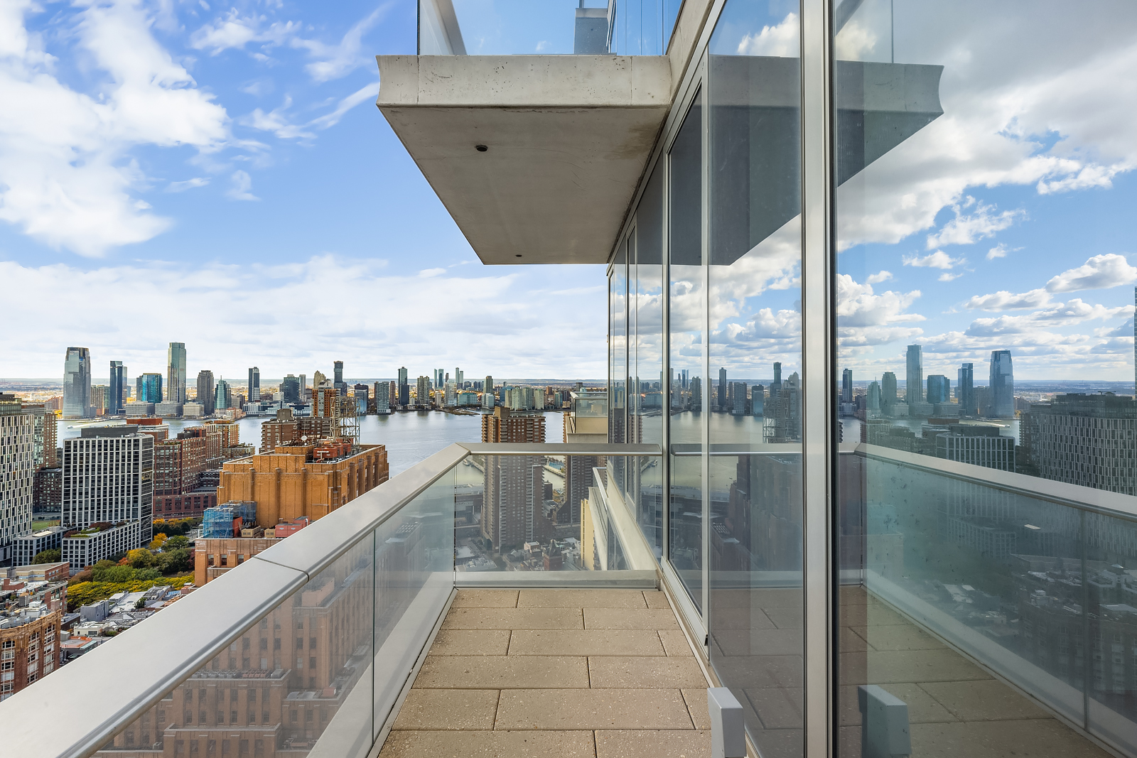 56 Leonard Street, Unit 39BEAST Manhattan, NY 10013 - Photo 6 of 18 a view of a balcony with city view