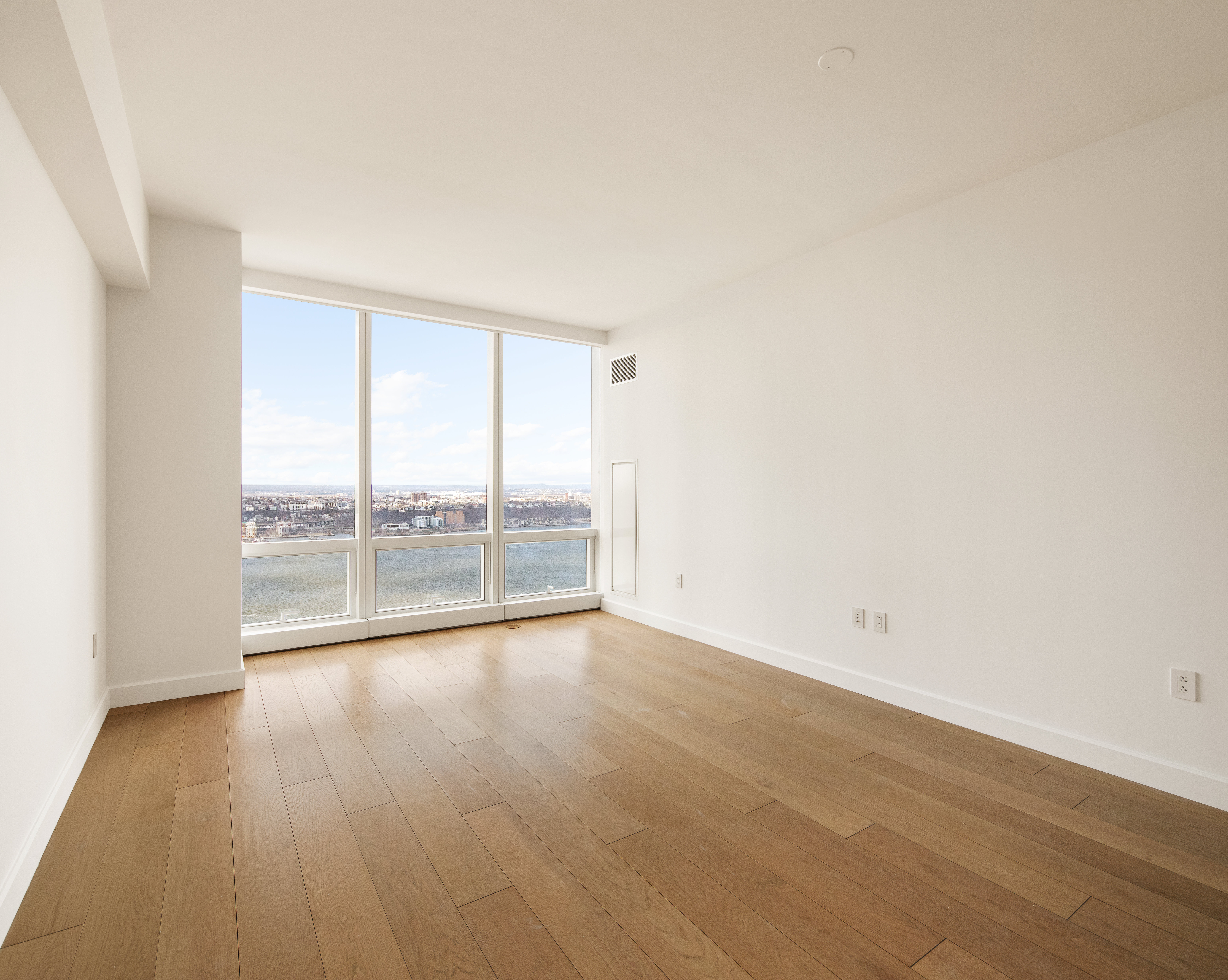 15 Hudson Yards, Unit 37F Manhattan, NY 10001 - Photo 2 of 8 wooden floor in an empty room with a window