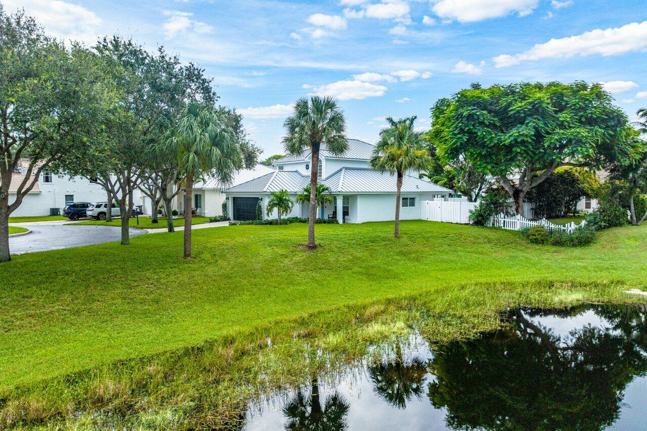 1182 Canoe Point Delray Beach, FL 33444 - Photo 41 of 46 a view of a house with a backyard