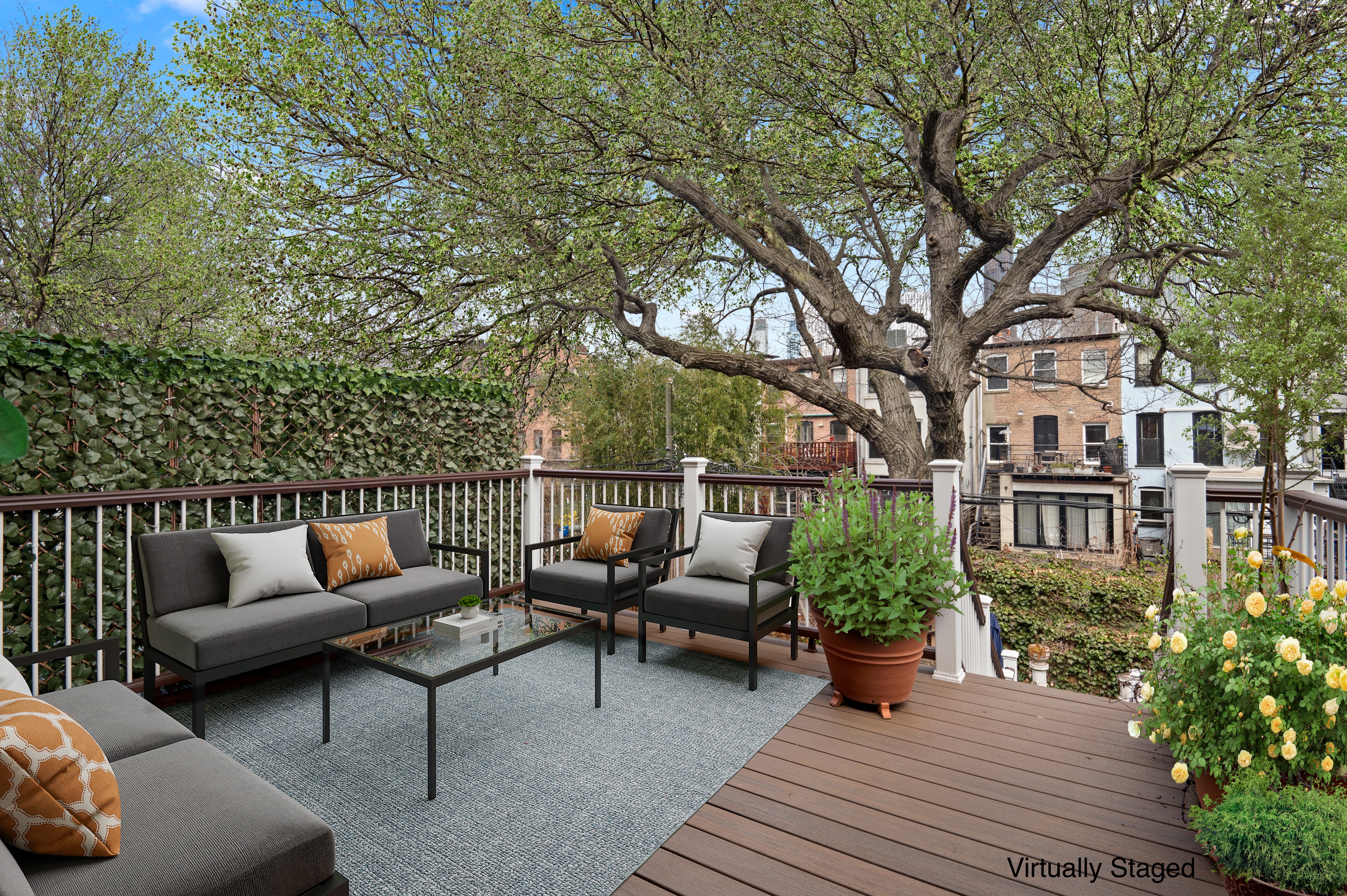457 Warren Street Brooklyn, NY 11217 - Photo 11 of 16 a view of a patio with couches chairs and a potted plant