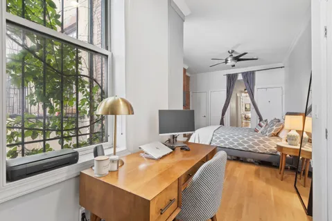 a room with furniture and a window