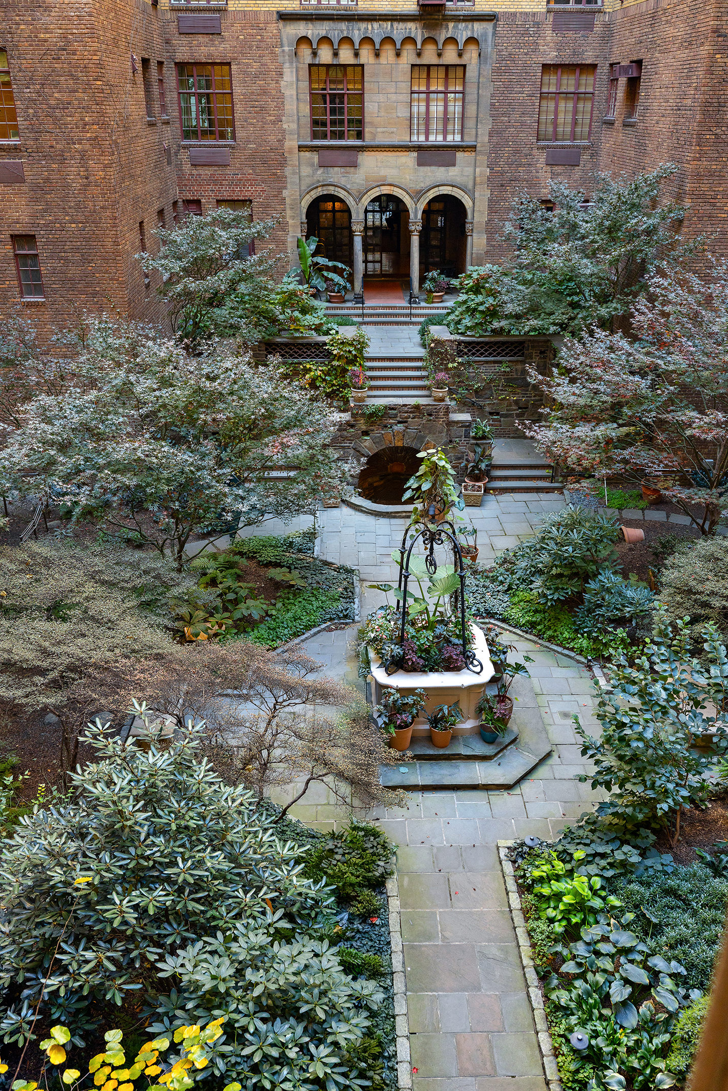 115 East 67th Street, Unit 3C Manhattan, NY 10065 - Photo 18 of 21 a front view of a house with a yard
