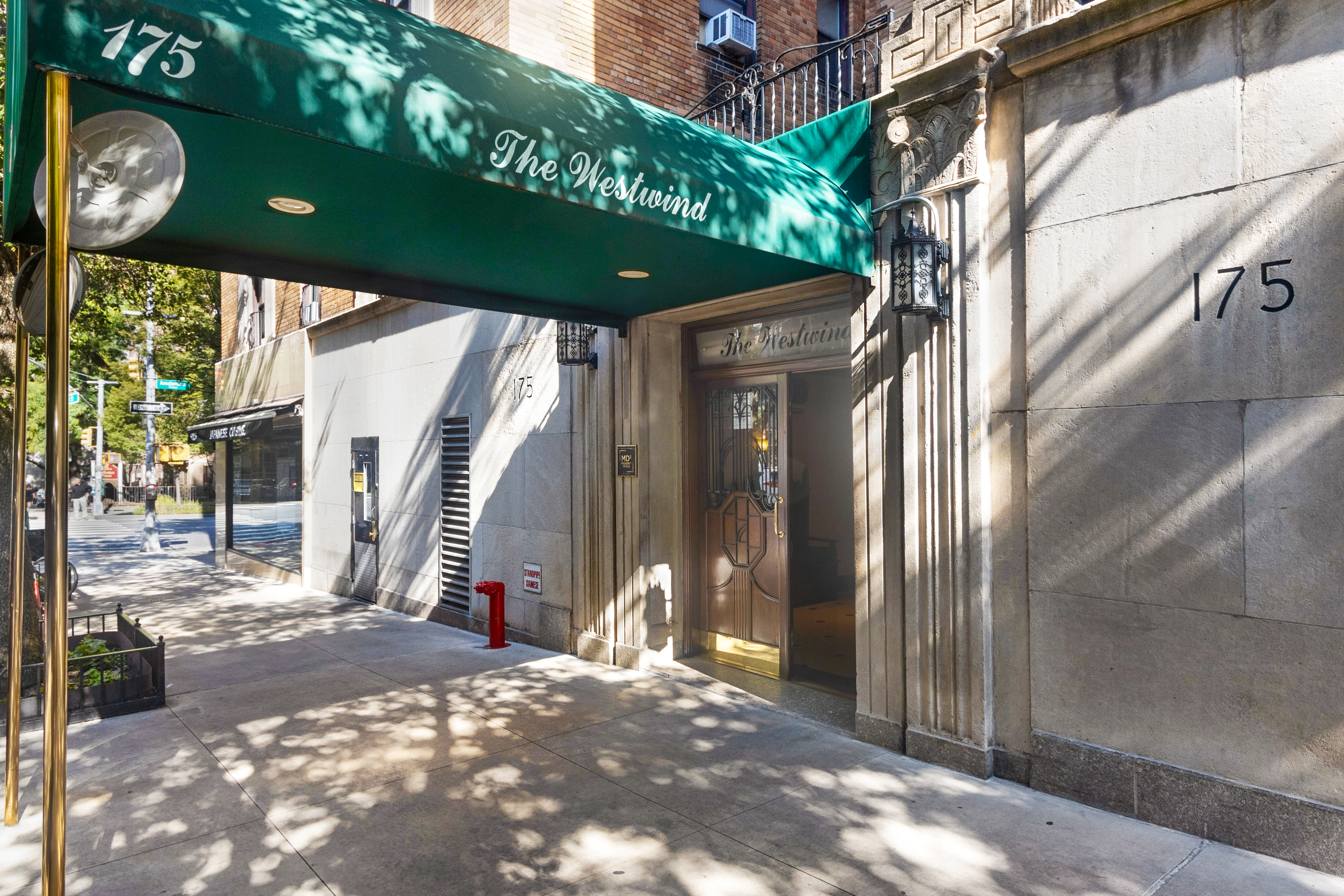 175 West 93rd Street, Unit 17I Manhattan, NY 10025 - Photo 15 of 18 a view of a house with a tree