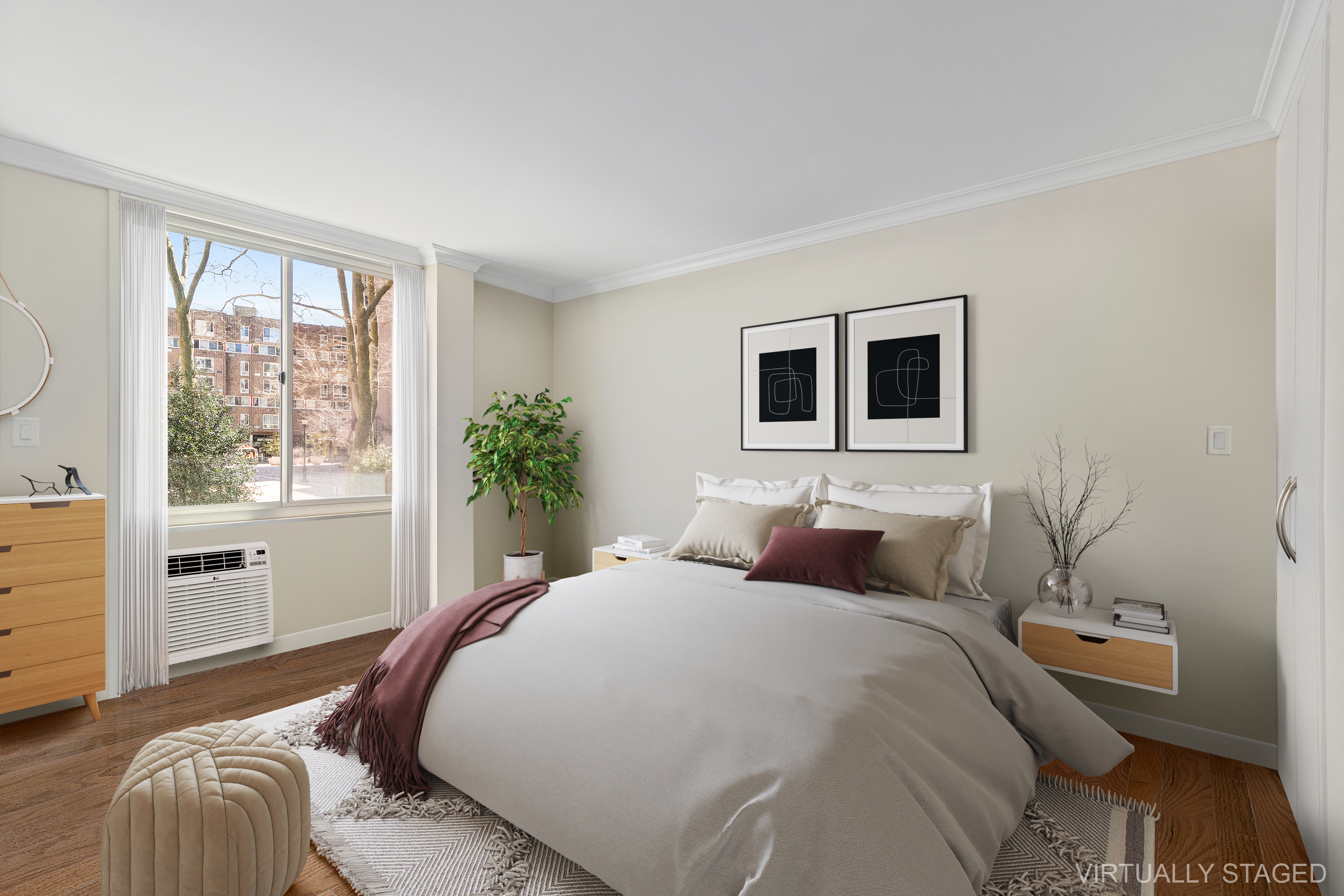 551 Main Street, Unit 208 Manhattan, NY 10044 - Photo 10 of 36 a bedroom with a large bed and a window