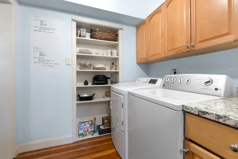 a utility room with washer and dryer