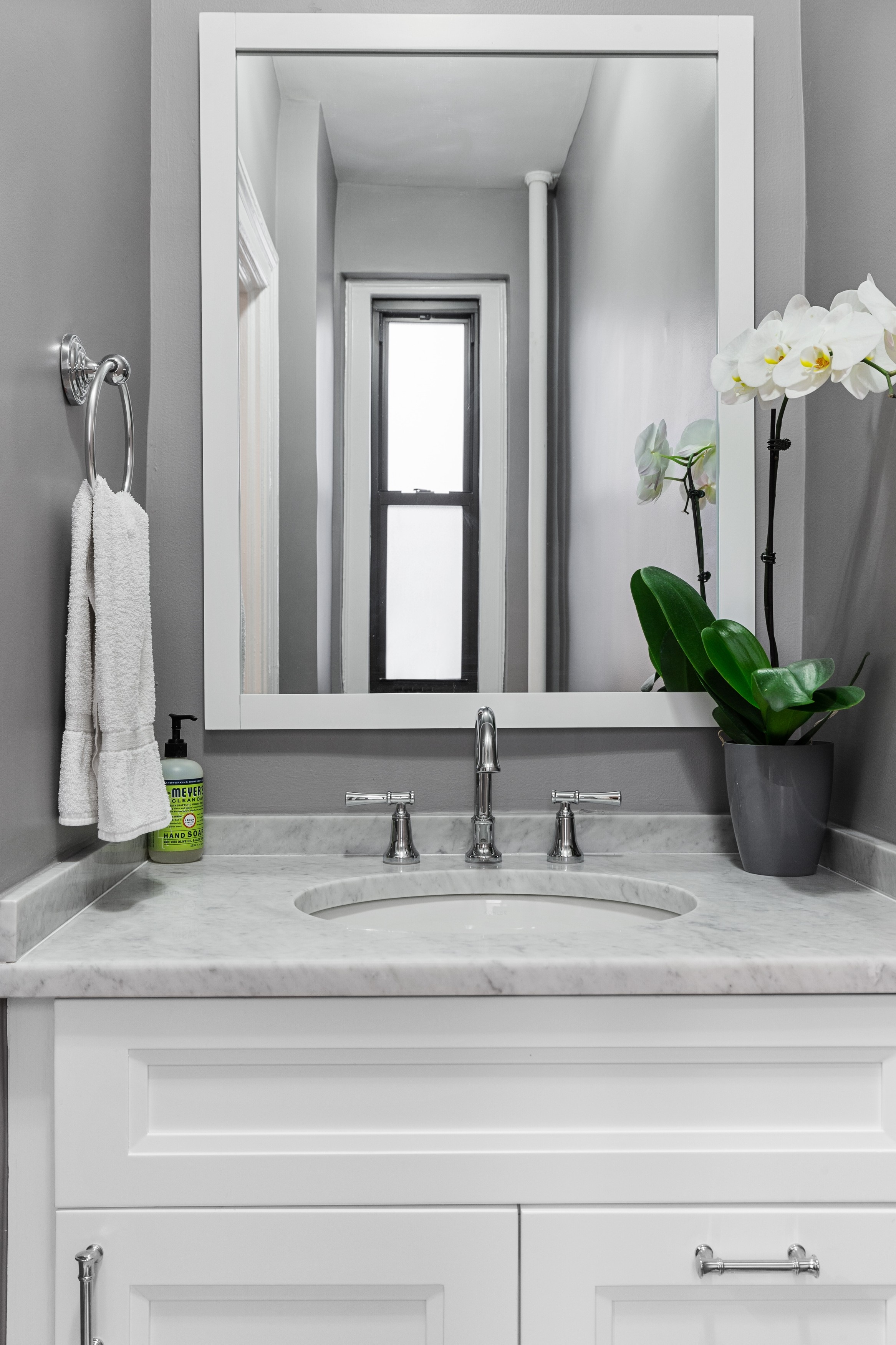 125 Cabrini Boulevard, Unit A52 Manhattan, NY 10033 - Photo 14 of 20 a bathroom with sink and mirror