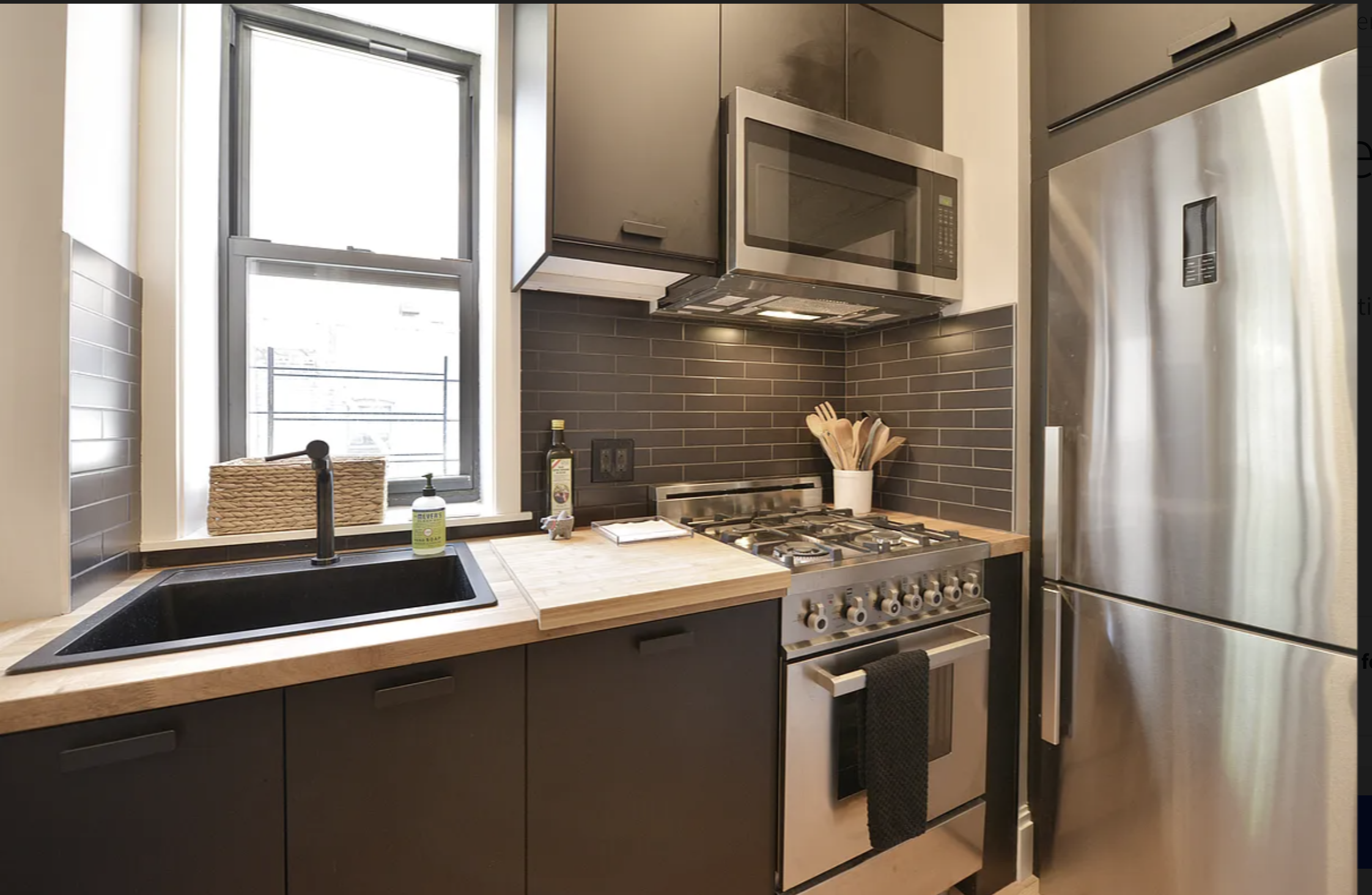 120 East 83rd Street, Unit 5C Manhattan, NY 10028 - Photo 2 of 8 a kitchen with a sink stove and refrigerator