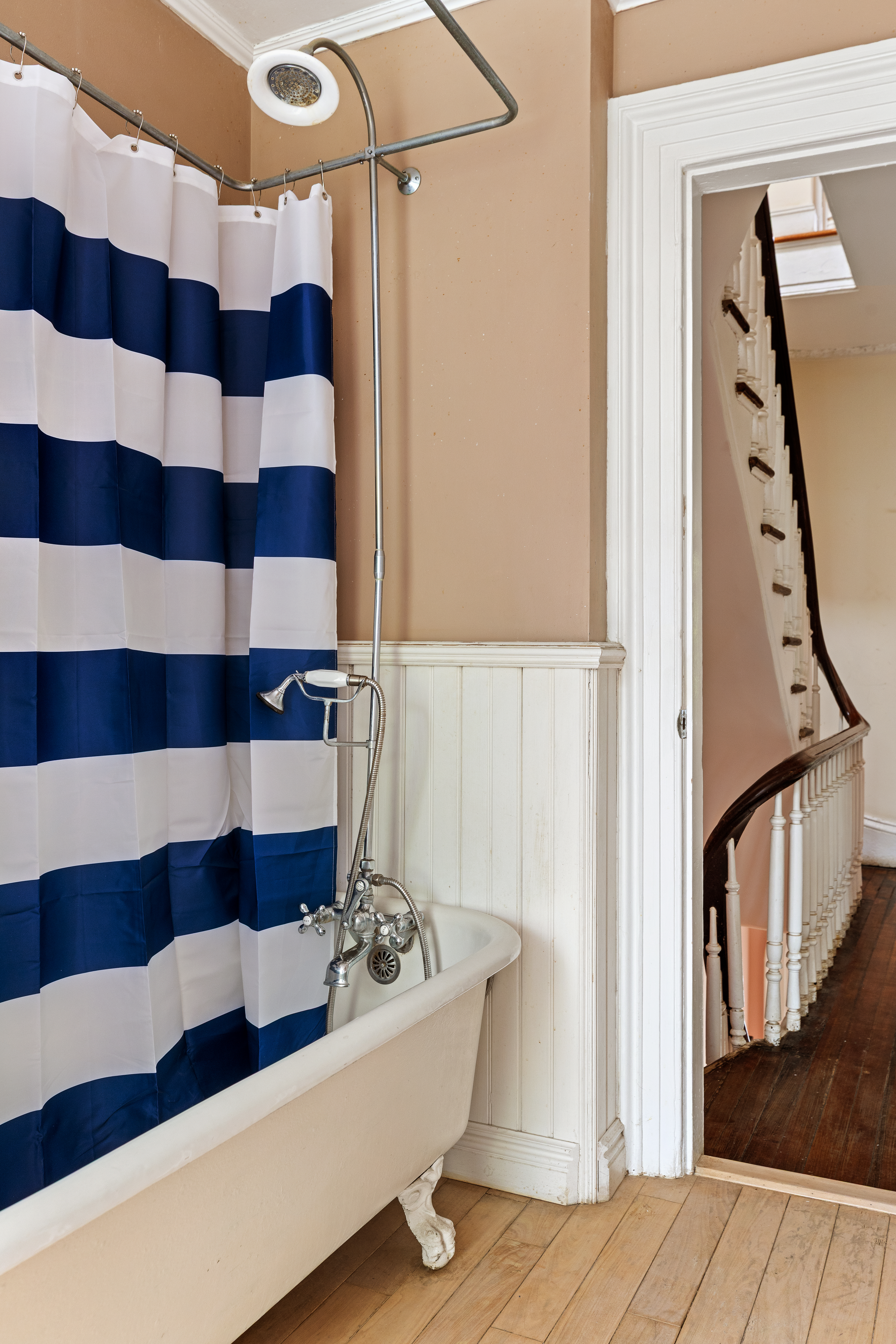 152 Dekalb Avenue Brooklyn, NY 11217 - Photo 13 of 27 a bathroom with a bathtub and a shower
