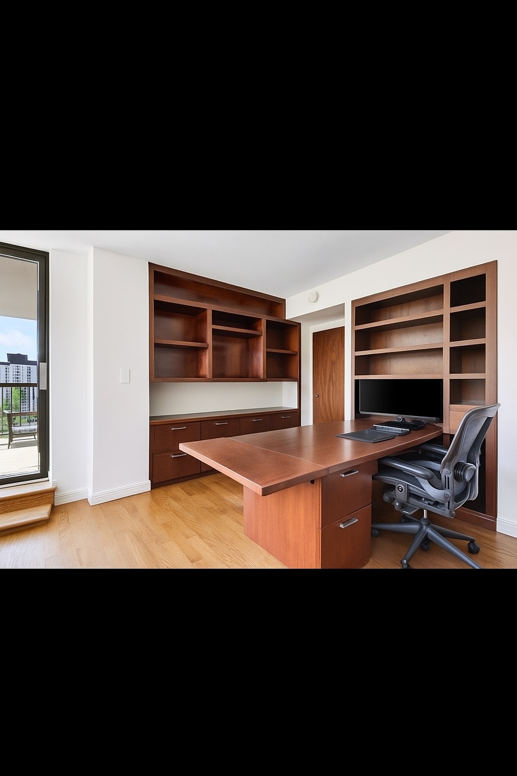 343 East 74th Street, Unit 15D Manhattan, NY 10021 - Photo 8 of 14 a view of an empty room with furniture
