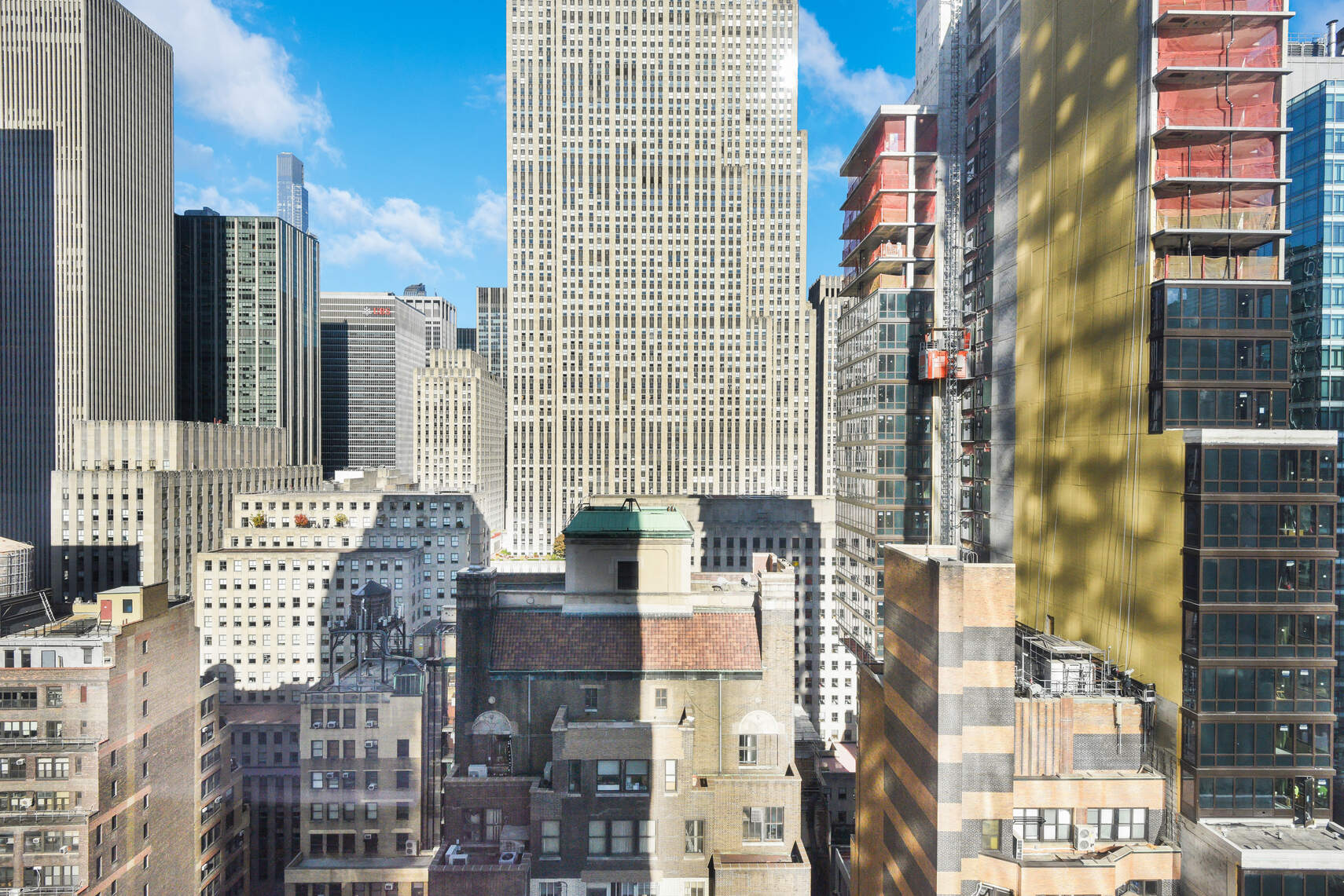 50 West 47th Street, Unit Undisclosed Manhattan, NY 10036 - Photo 2 of 27 a city view with tall buildings