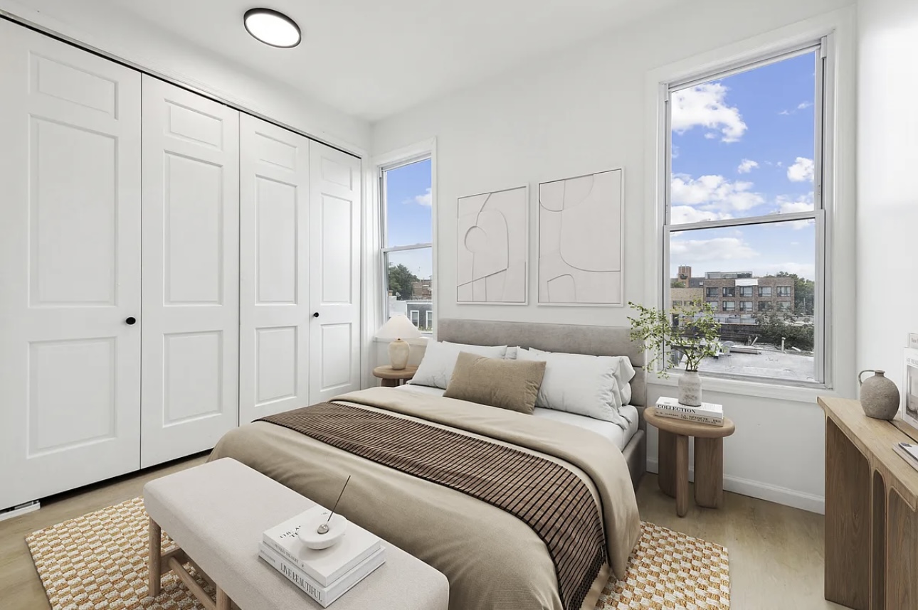 131 20th Street, Unit 2 Brooklyn, NY 11232 - Photo 4 of 7 a bedroom with a large bed and a window