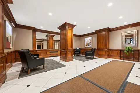 a view of a living room and dining room