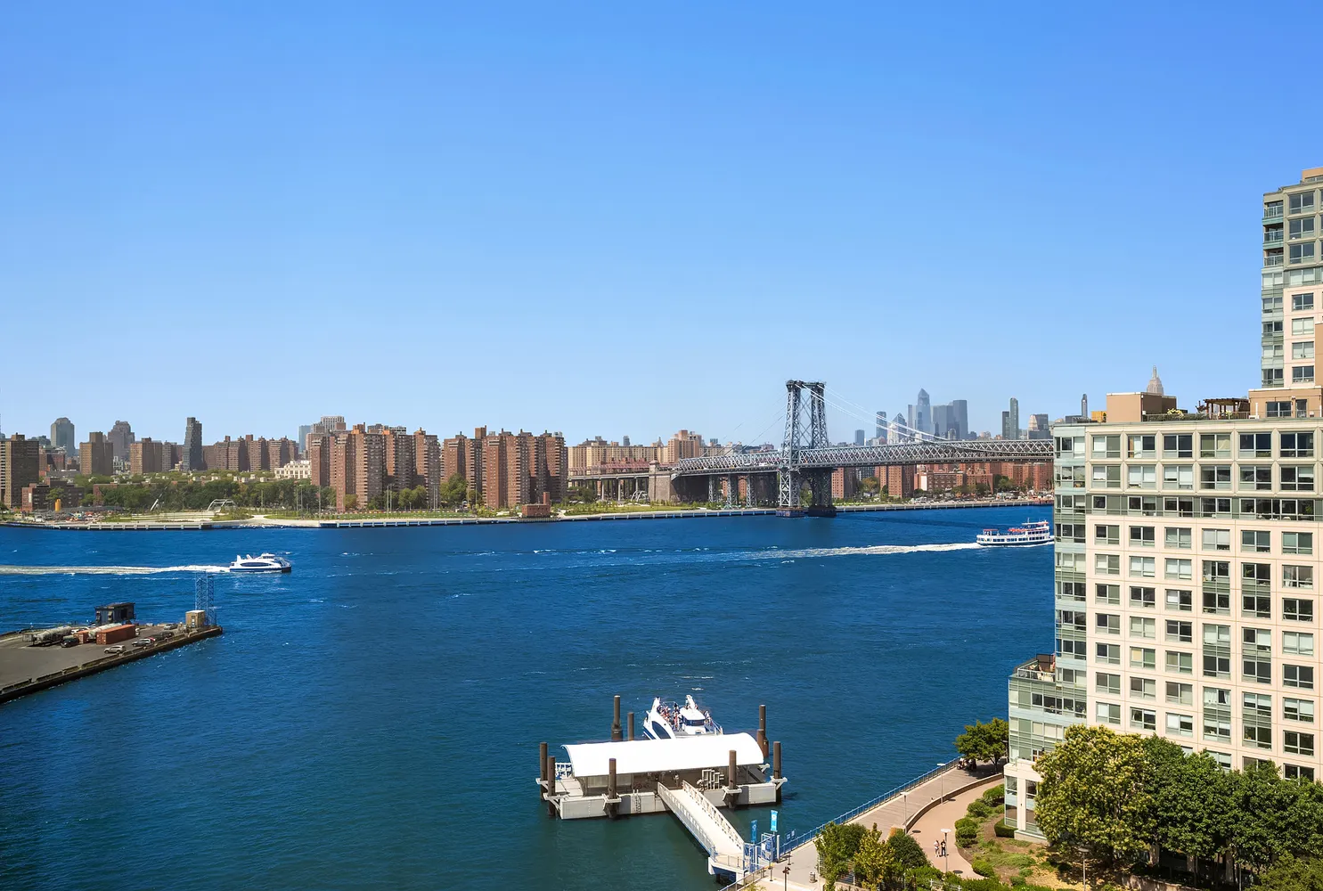 a view of a terrace with outdoor seating and city view