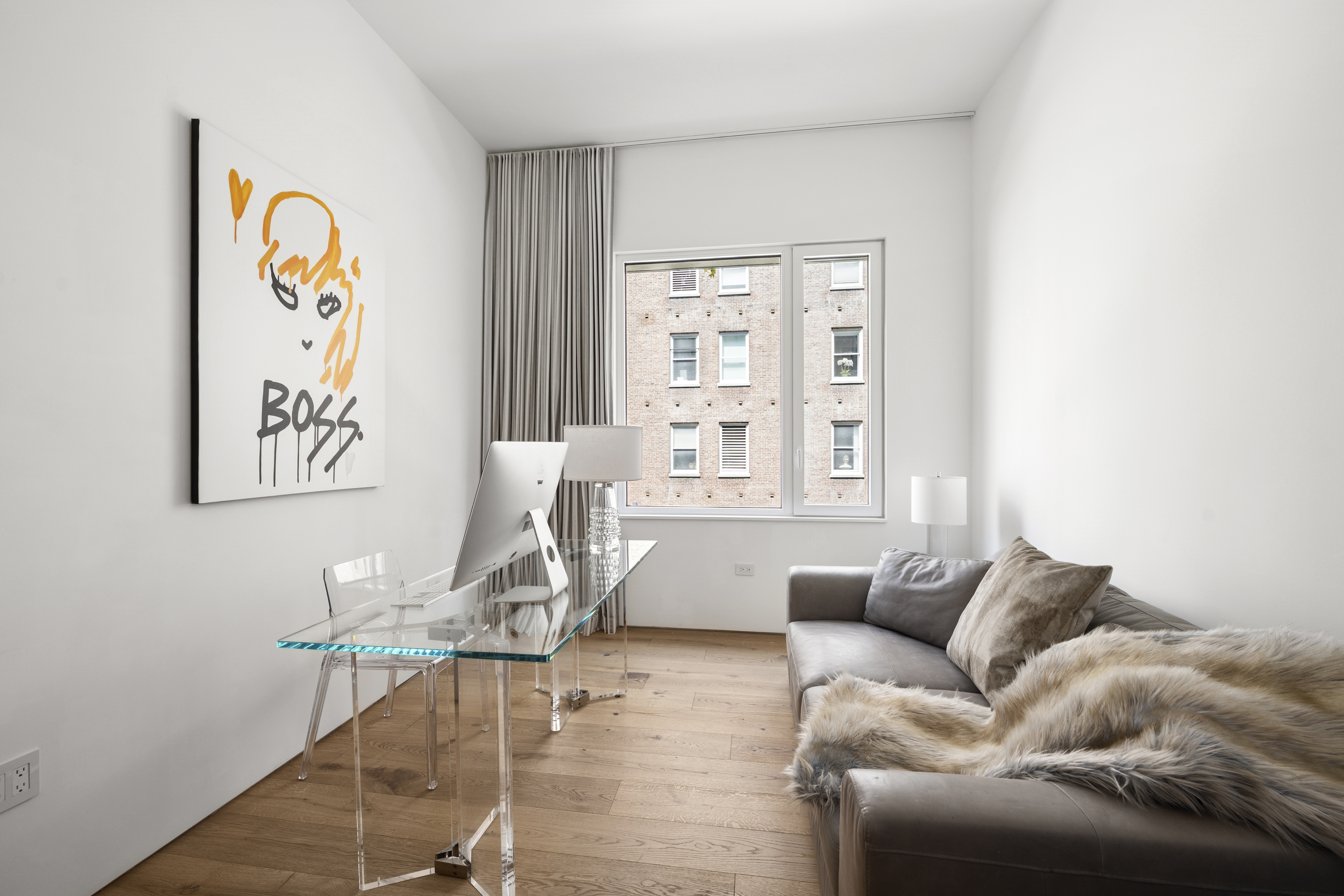 532 West 20th Street, Unit 4 Manhattan, NY 10011 - Photo 13 of 23 a living room with furniture and a window