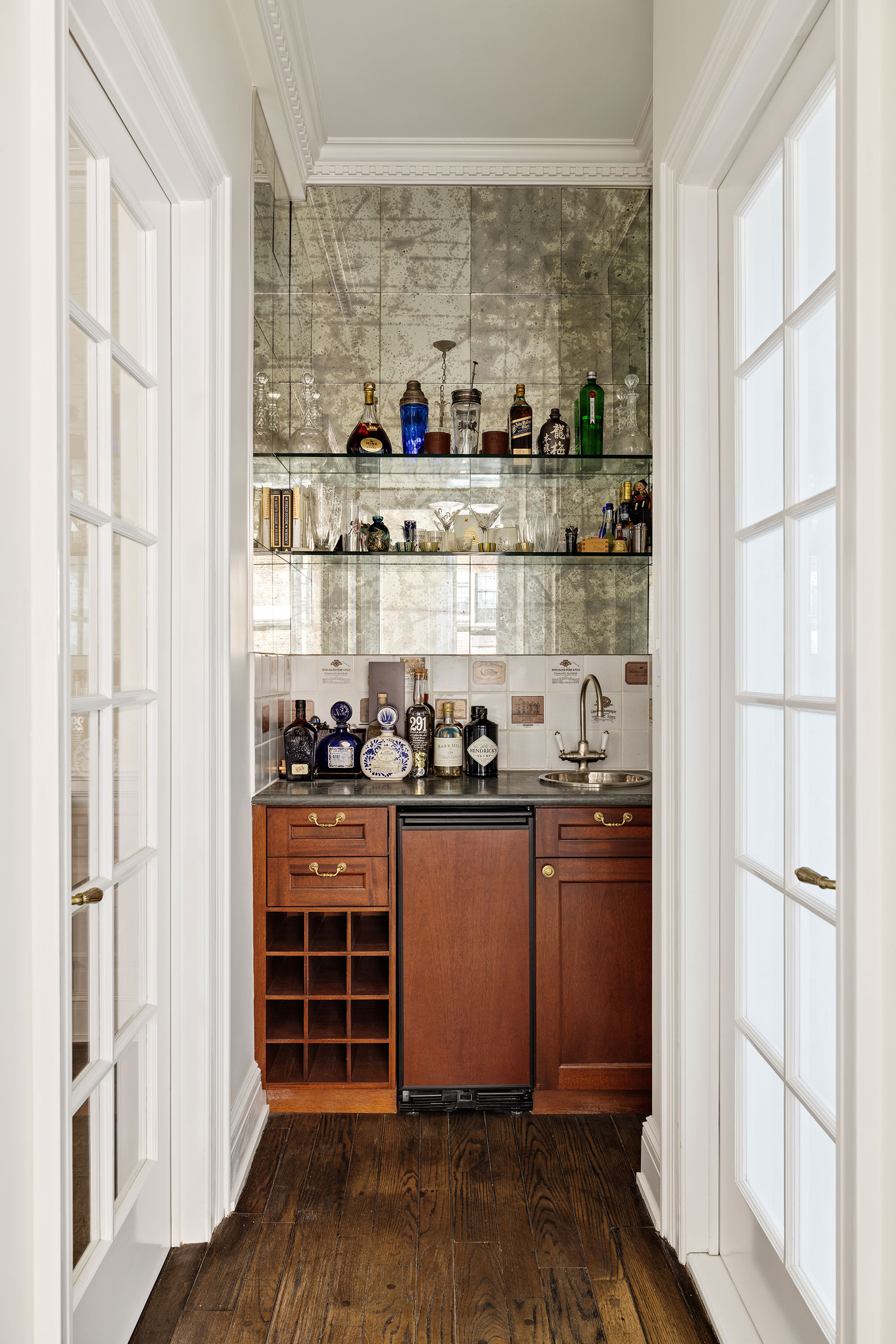 876 Park Avenue, Unit 9N Manhattan, NY 10075 - Photo 7 of 18 a kitchen with stainless steel appliances granite countertop a stove and a refrigerator