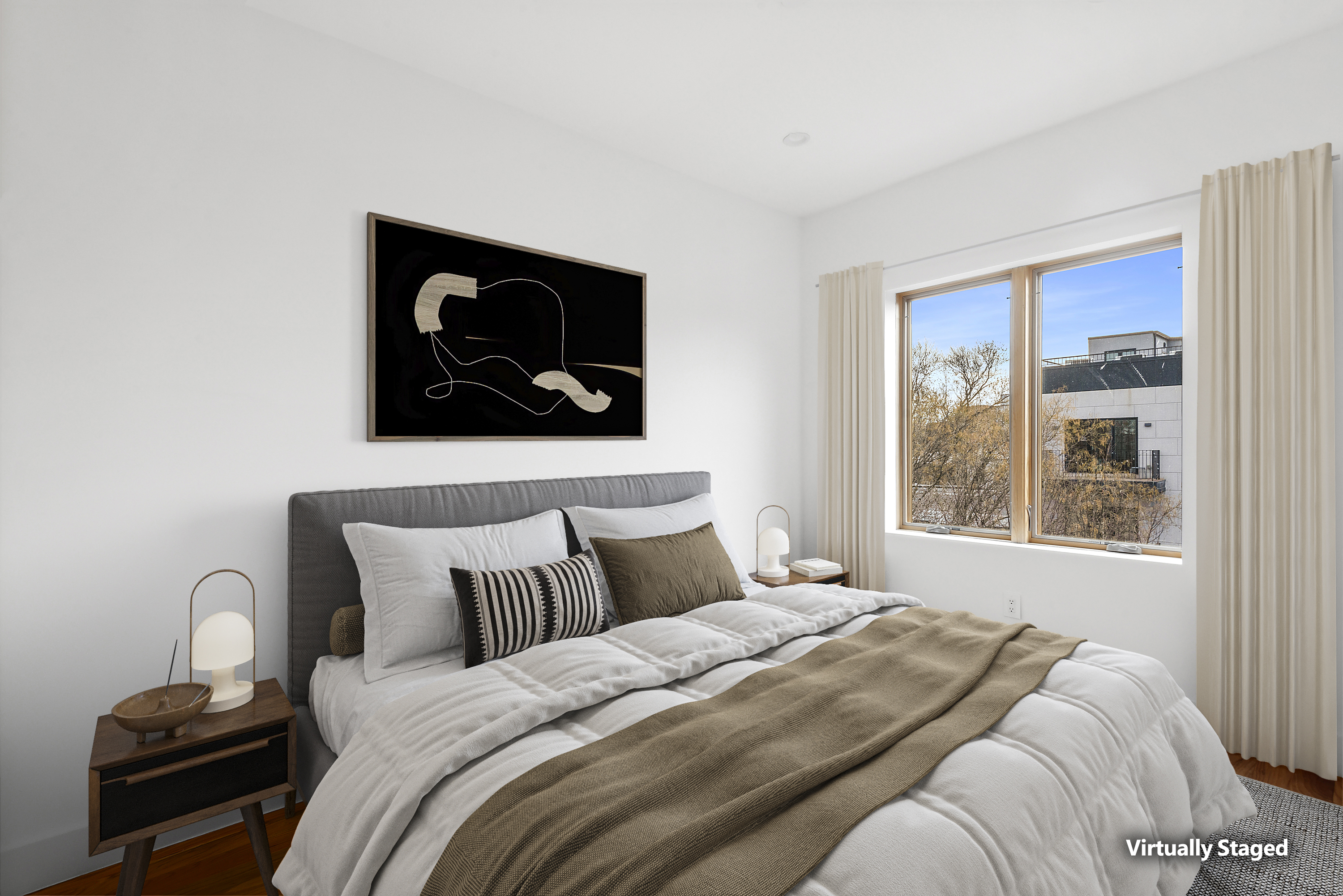 111 Woodbine Street, Unit 4 Brooklyn, NY 11221 - Photo 2 of 7 a bedroom with a bed and window