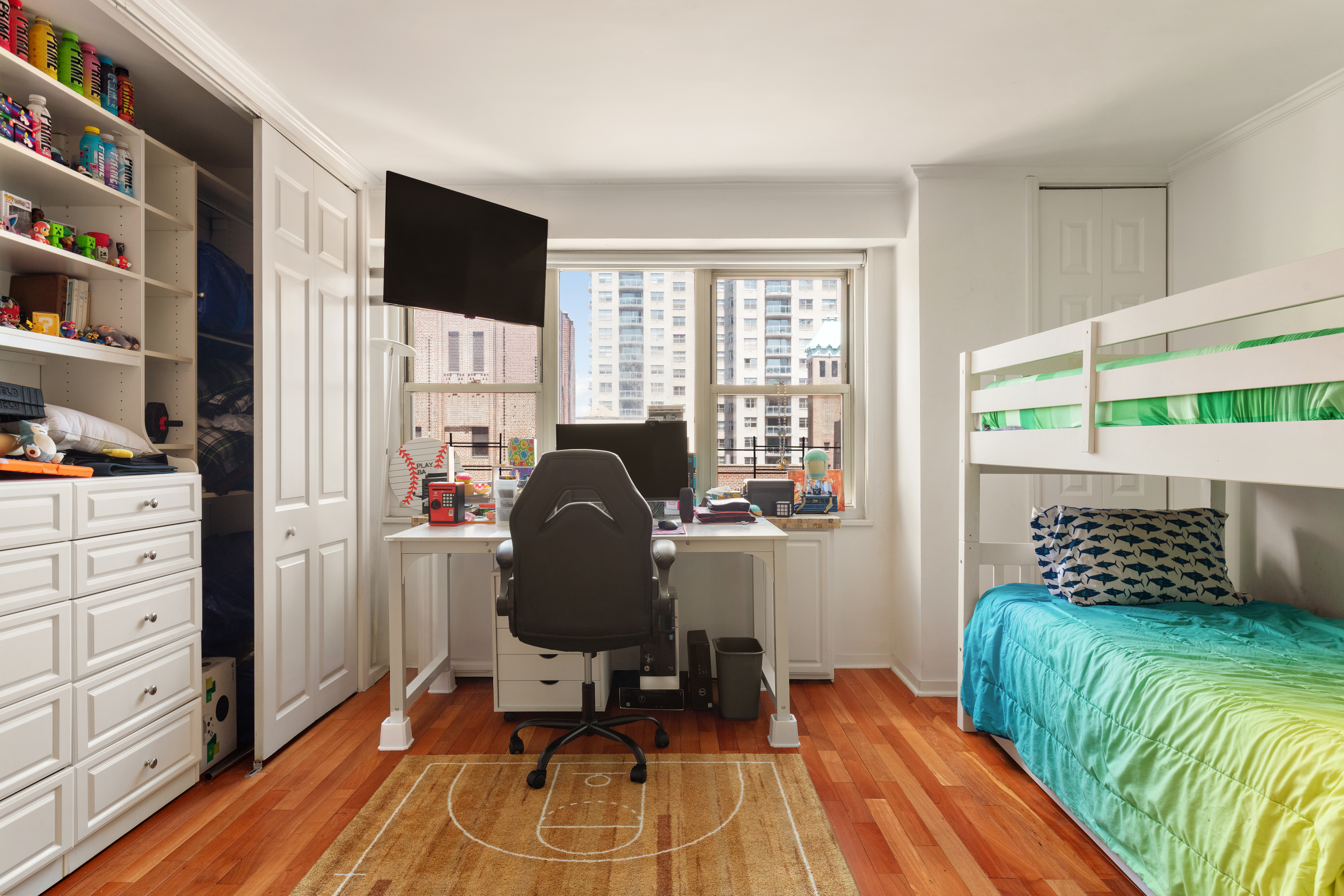 400 East 54th Street, Unit 21CDE Manhattan, NY 10022 - Photo 7 of 10 a view of a workspace with furniture and a window