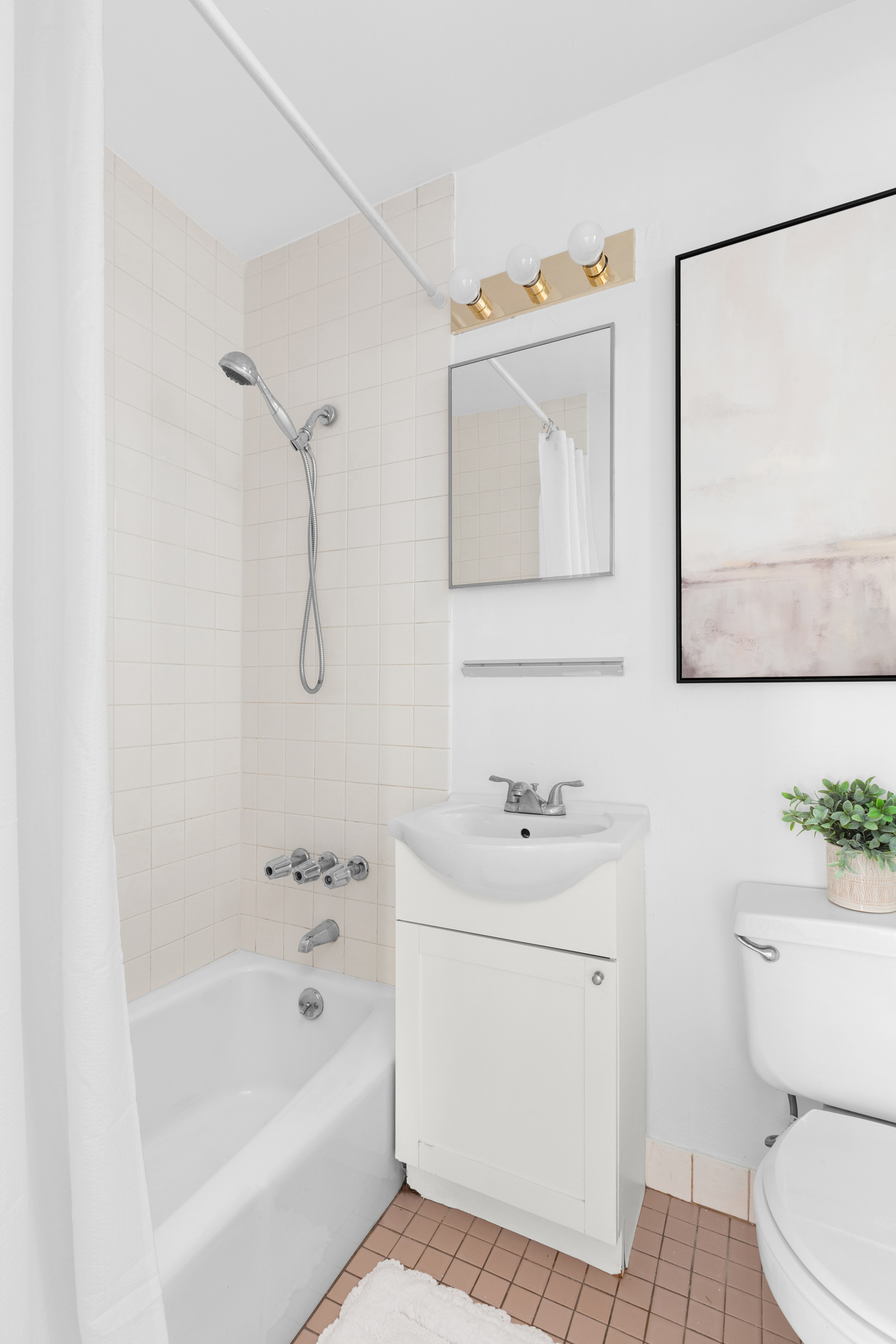 47 Reeve Place, Unit 1 Brooklyn, NY 11218 - Photo 6 of 8 a bathroom with a sink a toilet and bathtub