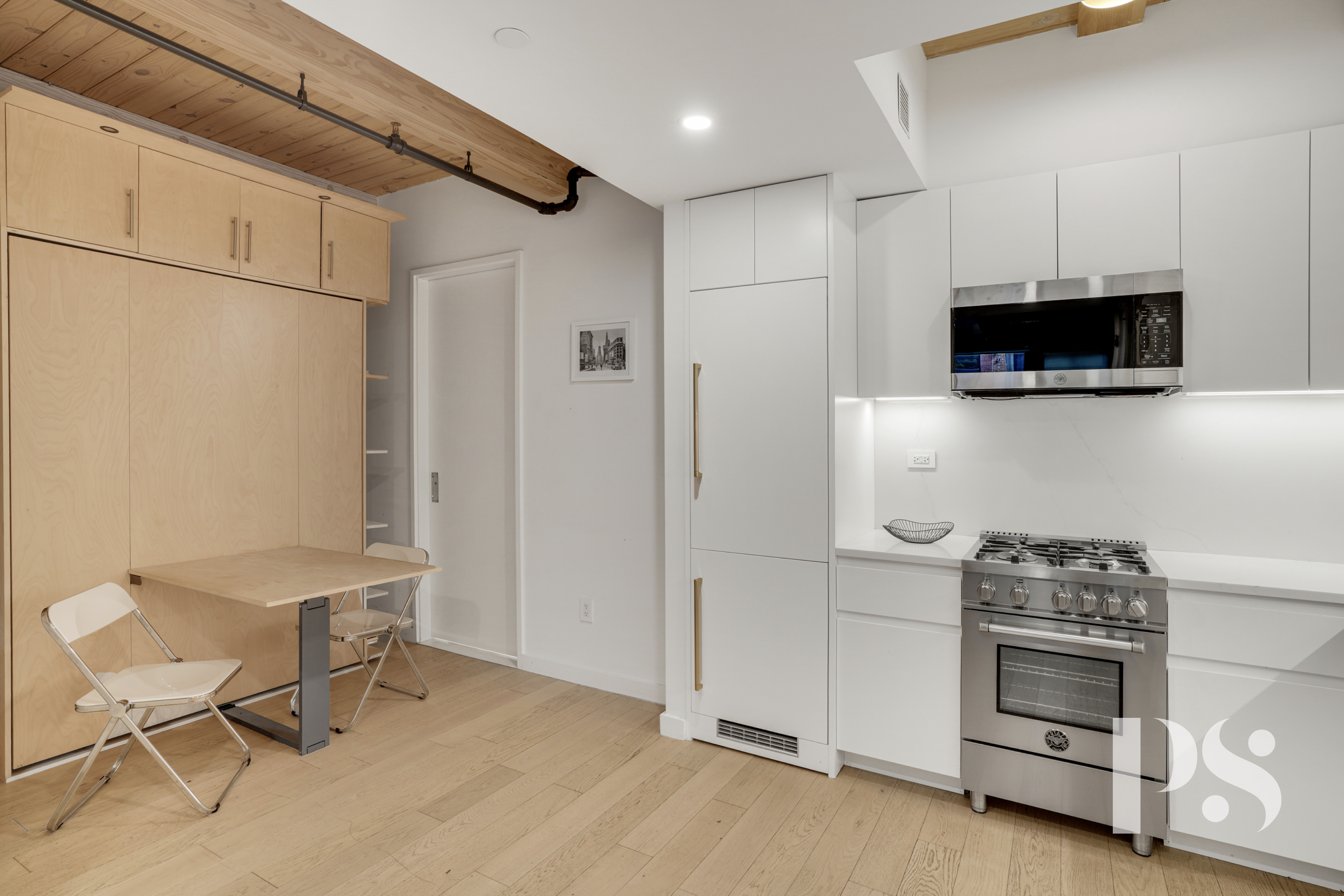 120 Java Street, Unit 1B Brooklyn, NY 11222 - Photo 3 of 12 a view of a livingroom with furniture and a flat screen tv