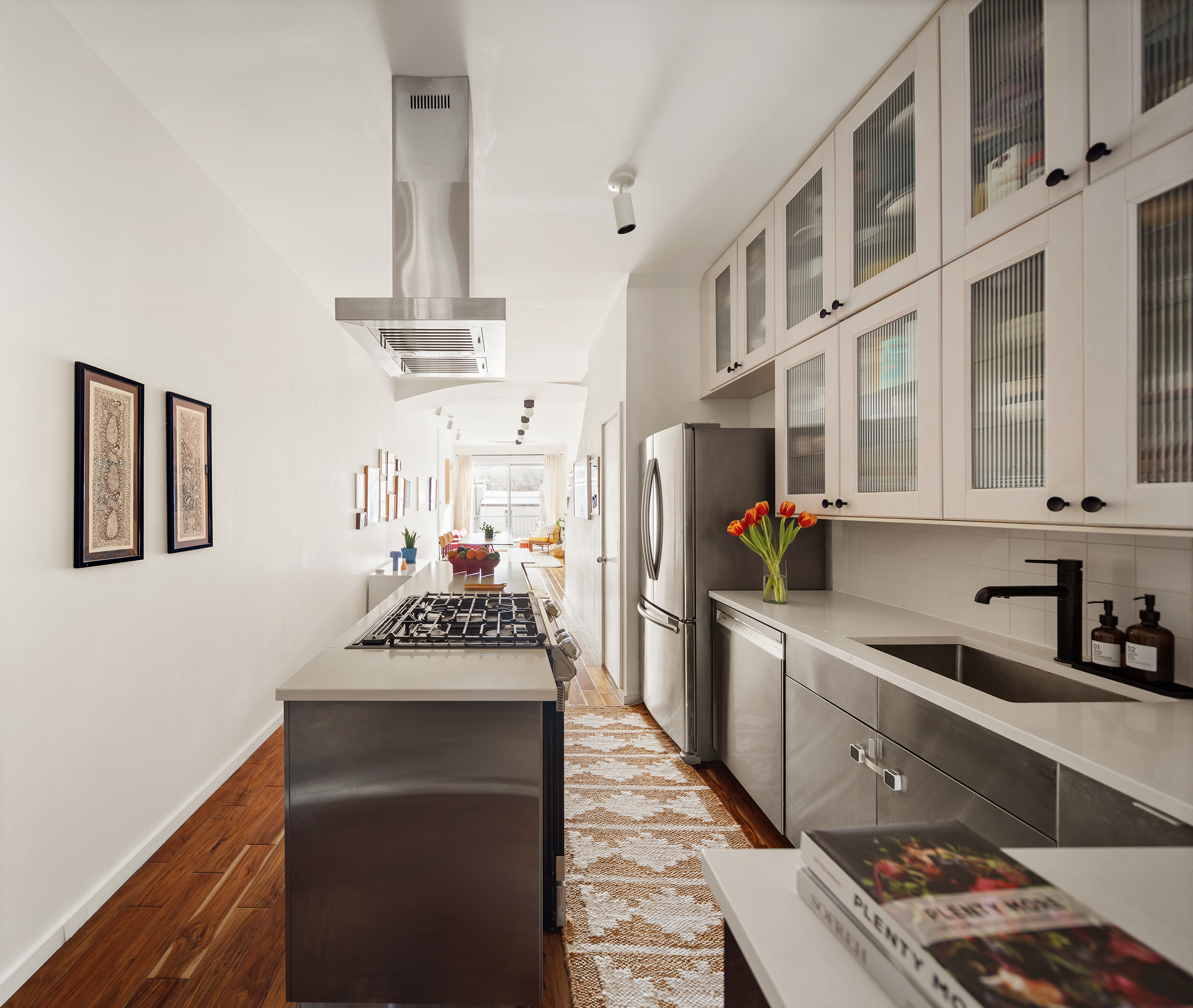 58 A Madison Street, Unit 2 Brooklyn, NY 11238 - Photo 4 of 12 a kitchen with stainless steel appliances a sink and cabinets