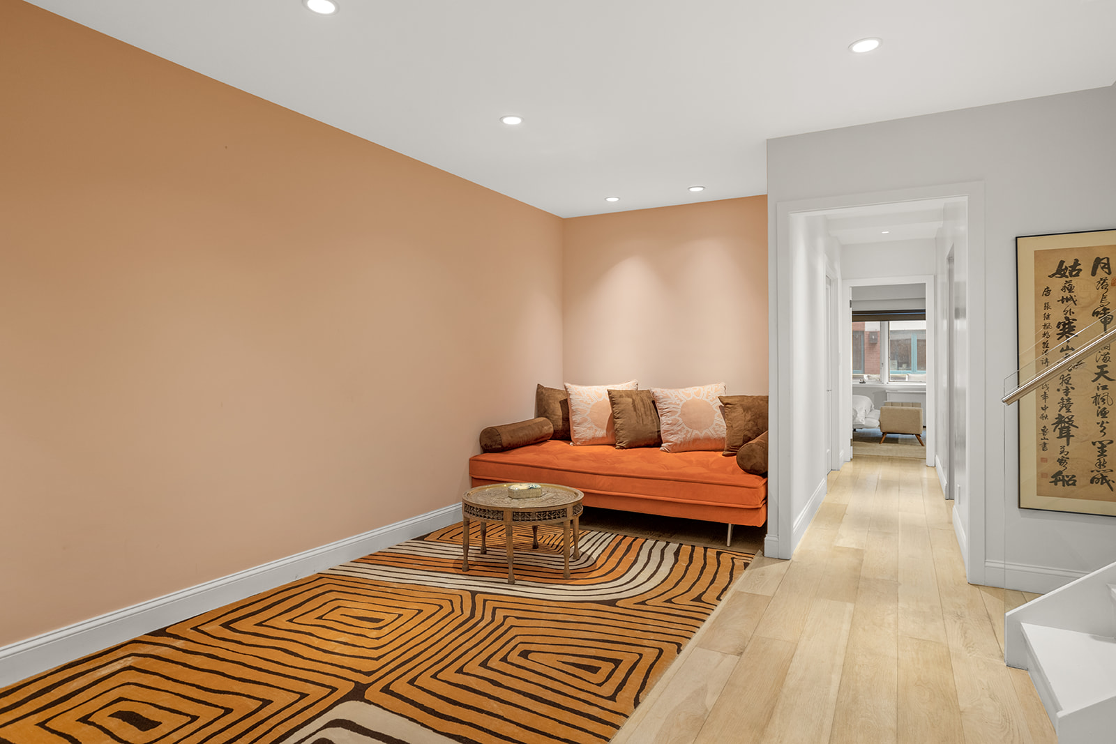 125 East 12th Street, Unit 1E Manhattan, NY 10003 - Photo 11 of 16 a spacious bedroom with a bed and wooden floor