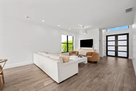 a bathroom with a sink toilet and mirror