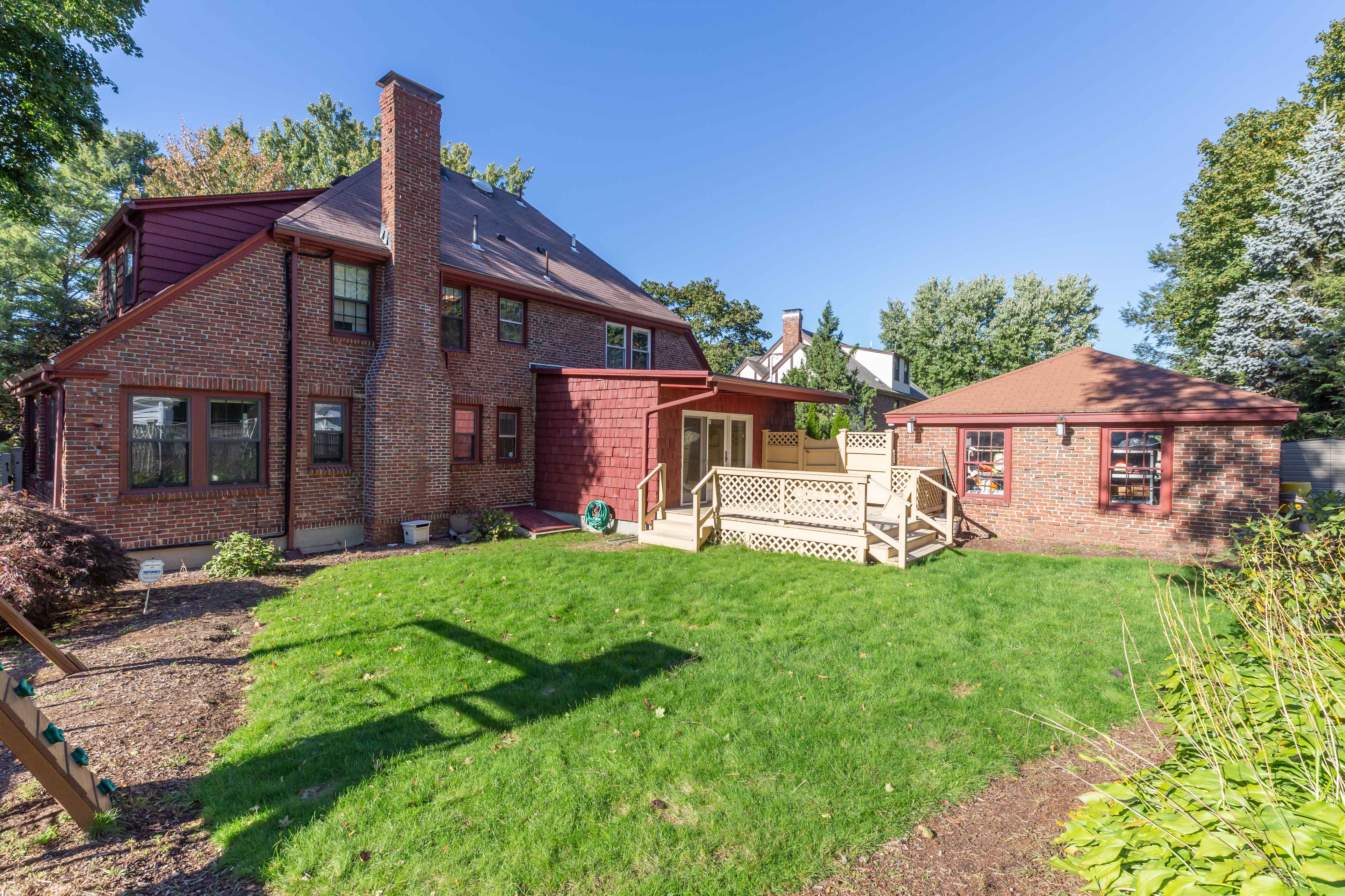 290 Dorset Road Waban, MA 02468 - Photo 23 of 23 a front view of a house with garden