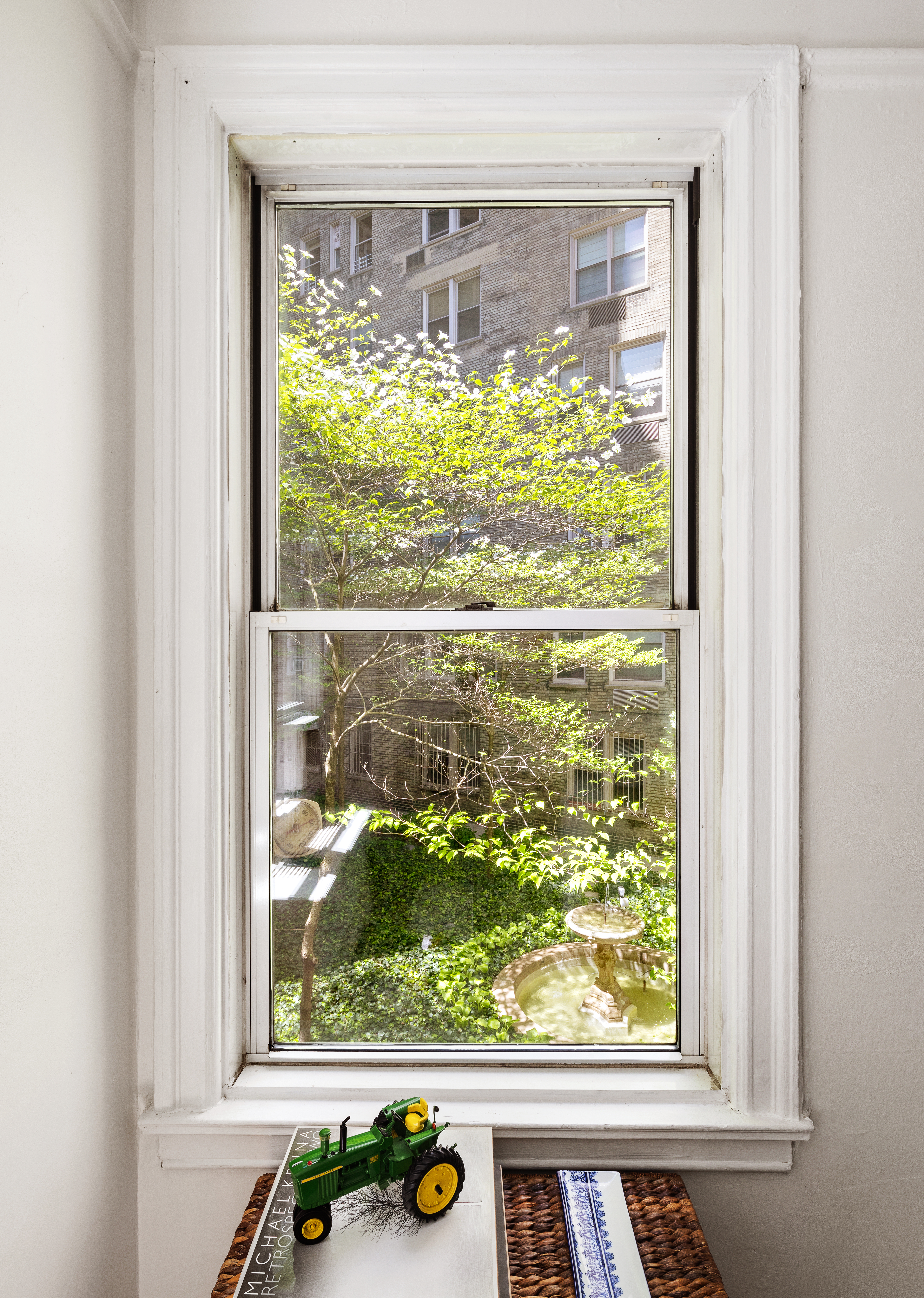 173-175 Riverside Drive, Unit 2L Manhattan, NY 10024 - Photo 5 of 18 a window with white green walls