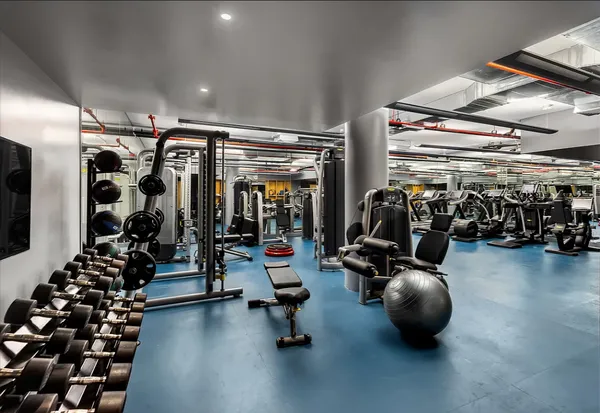 a view of parking garage with cars