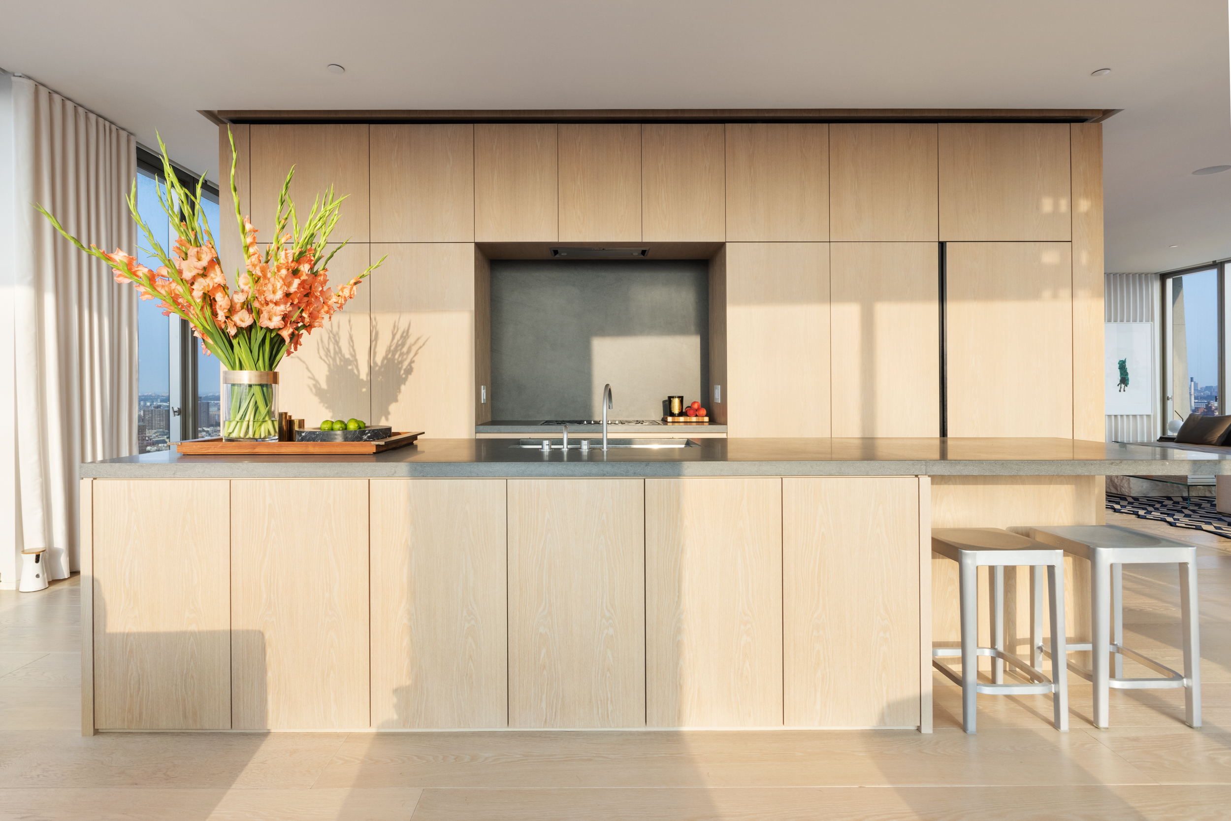 215 Chrystie Street, Unit PH2 Manhattan, NY 10002 - Photo 11 of 30 a view of a kitchen with furniture and a window