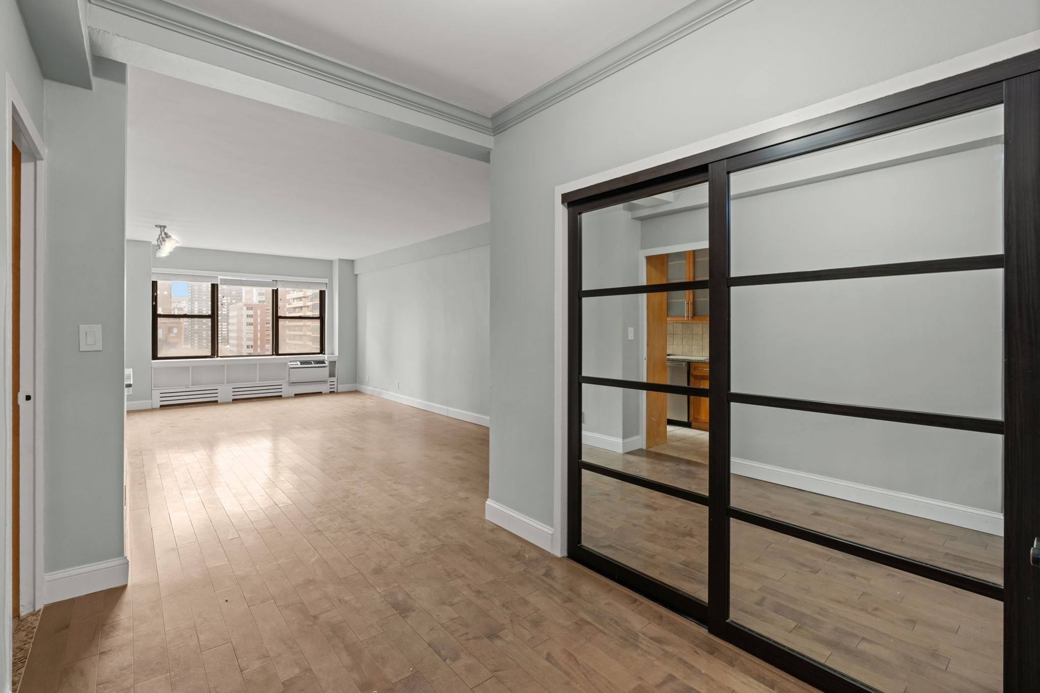 2 Tudor City Place, Unit 6JOS Manhattan, NY 10017 - Photo 2 of 16 a view of an empty room with a window