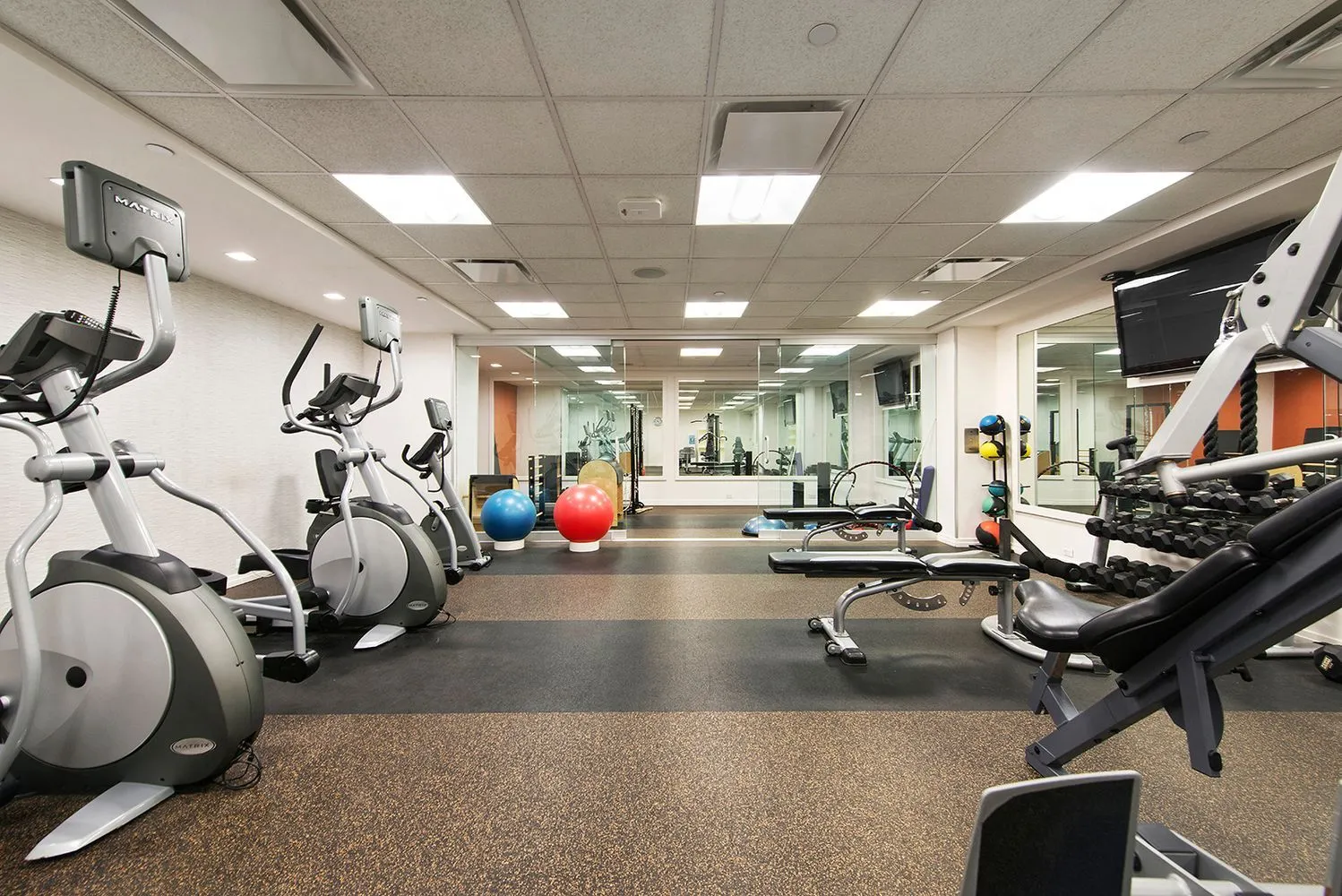 a view of a room with gym equipment
