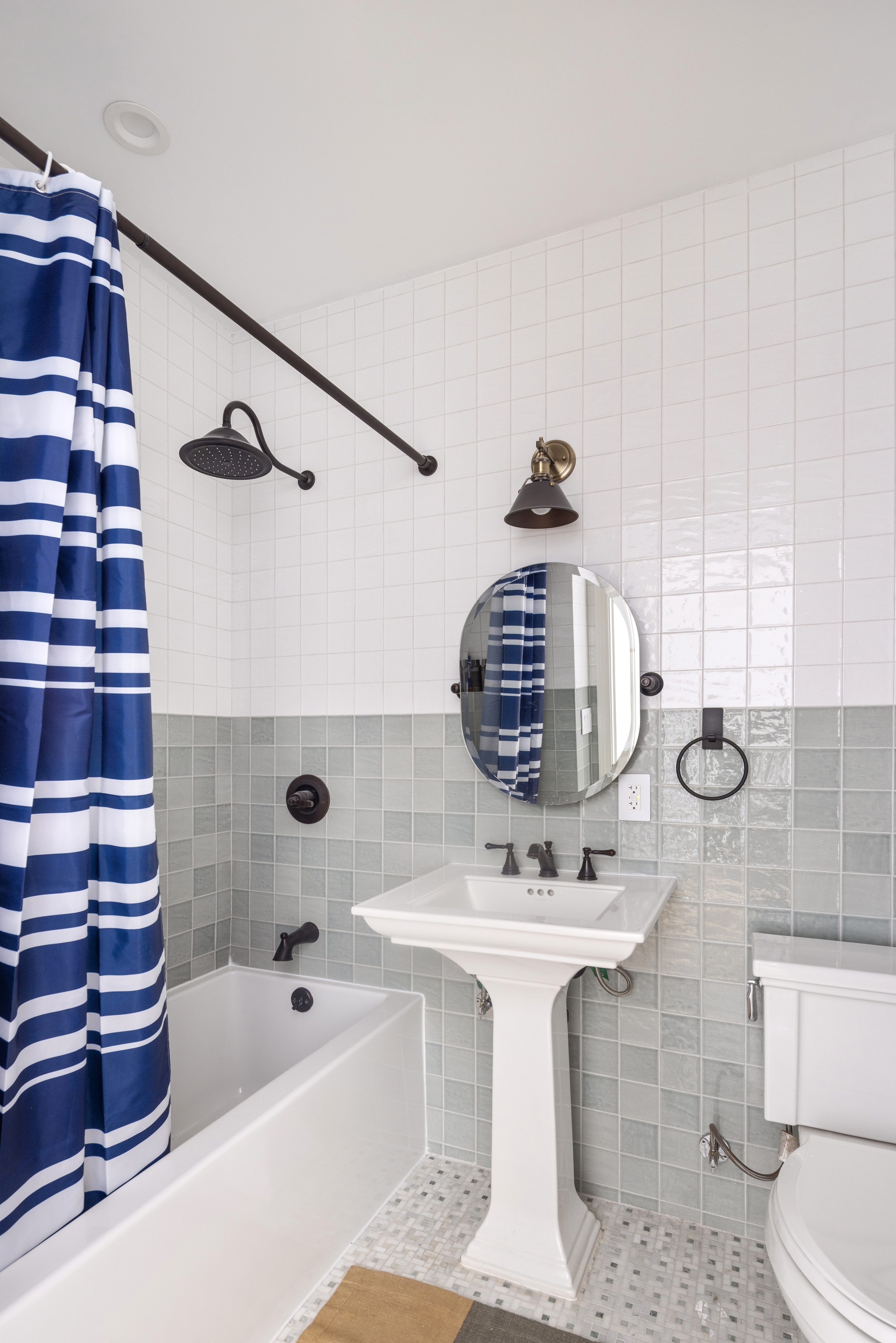 75 8th Avenue, Unit 2 Brooklyn, NY 11215 - Photo 11 of 16 a bathroom with a sink and a mirror