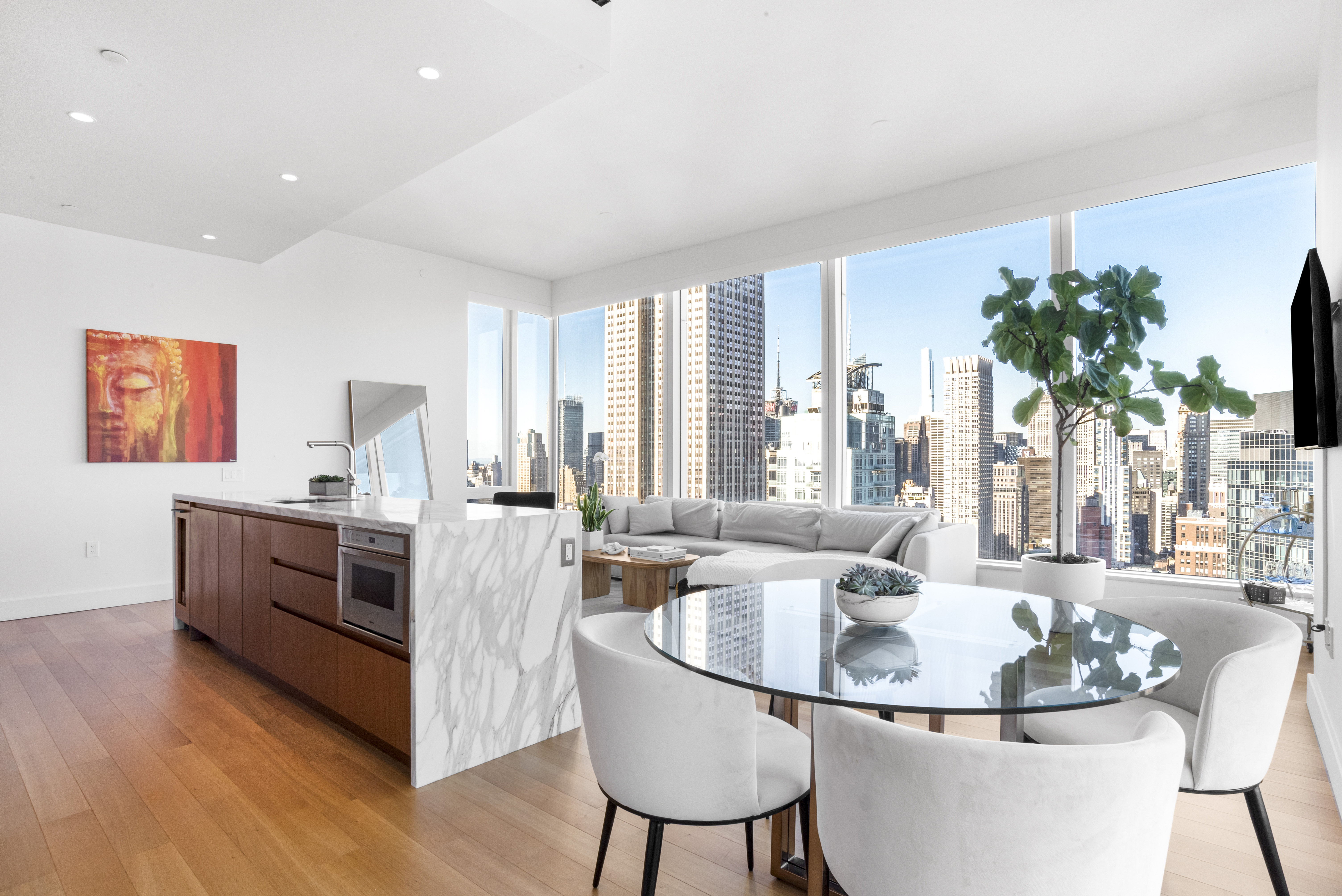 15 East 30th Street, Unit Undisclosed Manhattan, NY 10016 - Photo 5 of 23 a kitchen with a table and chairs