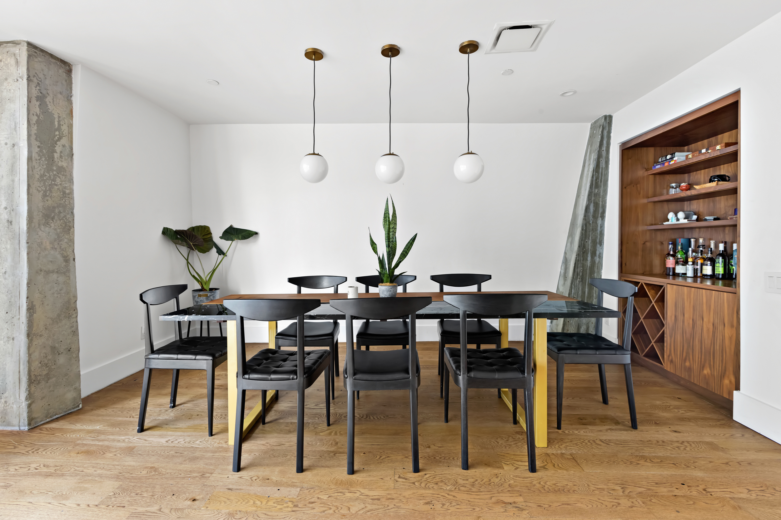 115 Norfolk Street, Unit 304 Manhattan, NY 10002 - Photo 5 of 15 a view of a dining room with furniture