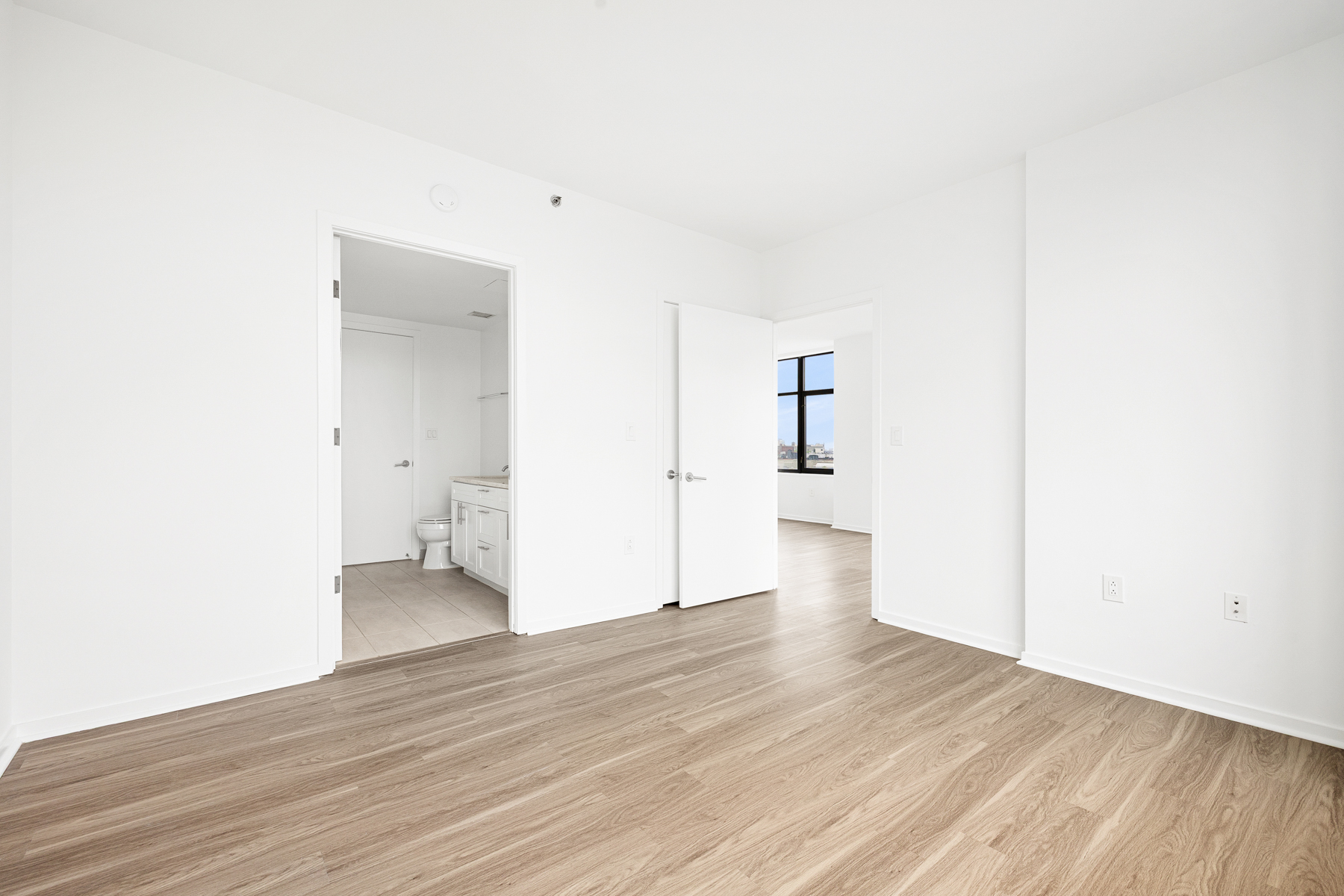 424 Bedford Avenue, Unit 6B Brooklyn, NY 11249 - Photo 8 of 11 a view of a room with wooden floor