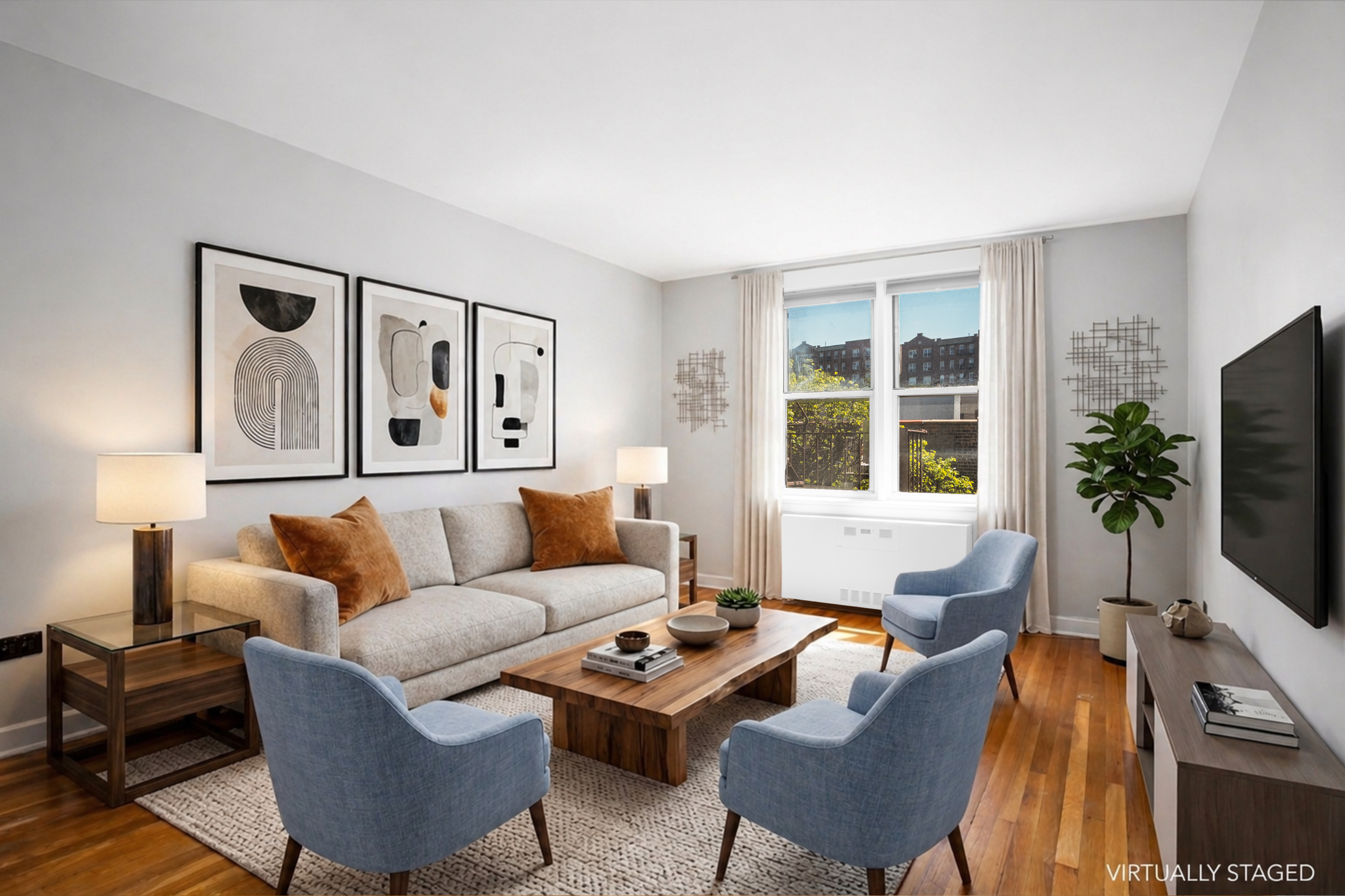 143 Bennett Avenue, Unit 6R Manhattan, NY 10040 - Photo 3 of 22 a living room with furniture flat screen tv and a large window