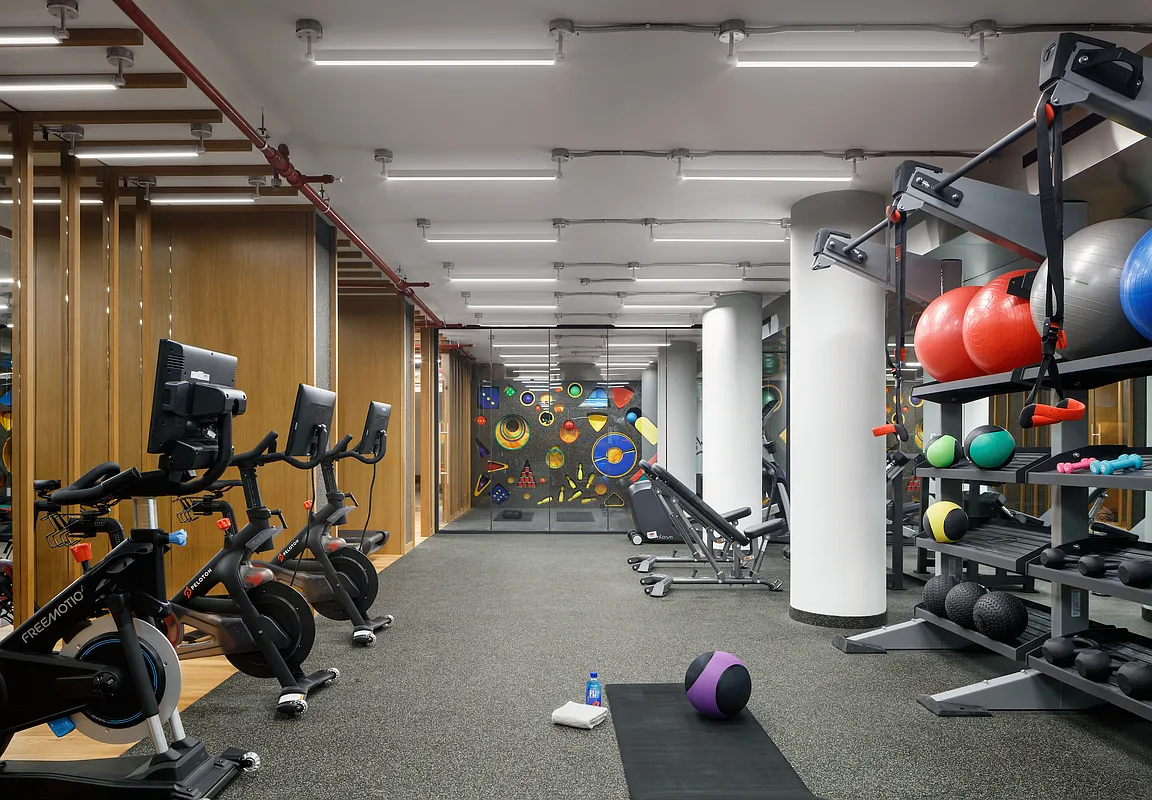 30 Warren Street, Unit 2C Manhattan, NY 10007 - Photo 11 of 18 a view of a room with gym equipment