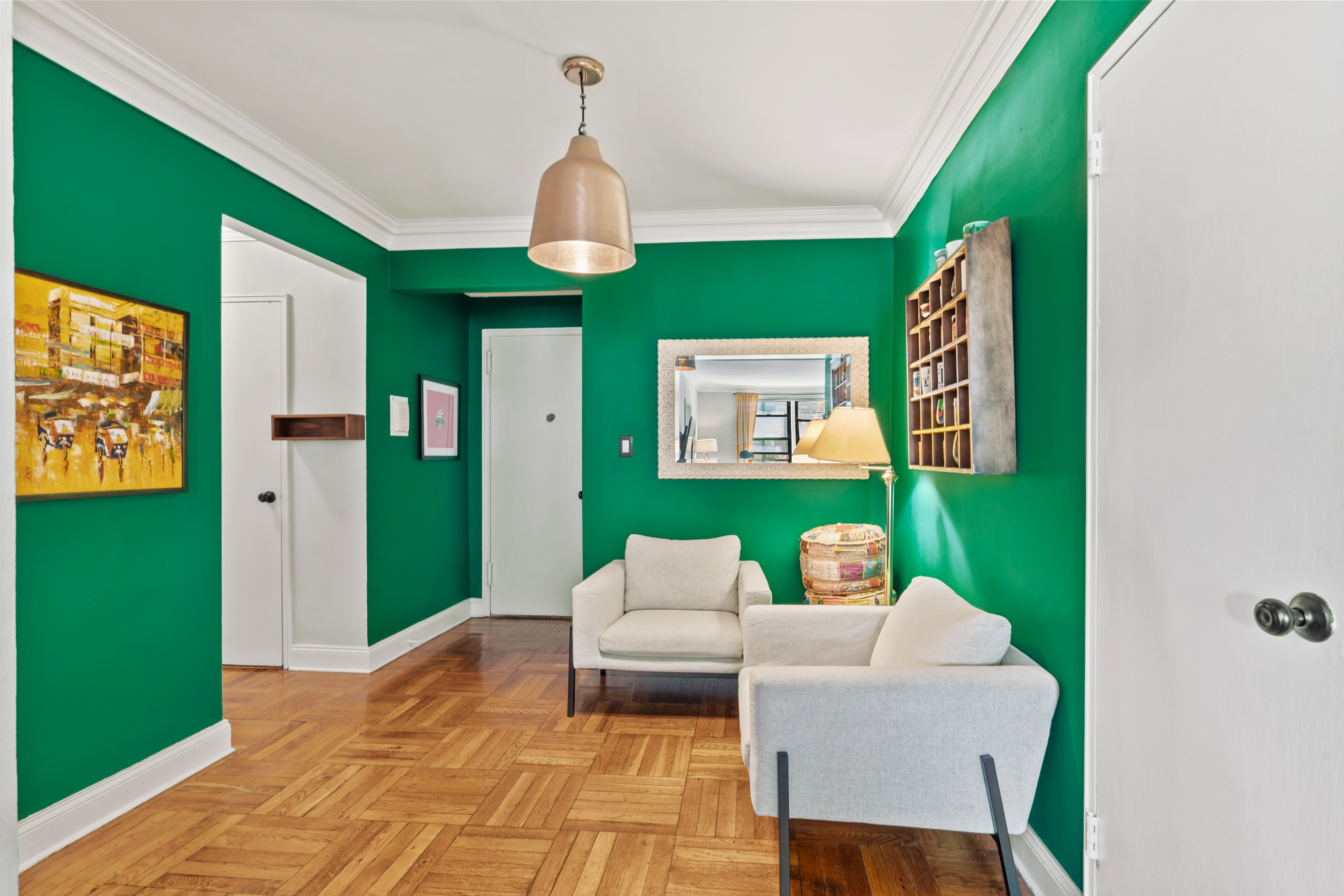 48-21 40th Street, Unit 1B Queens, NY 11104 - Photo 3 of 9 a living room with furniture and a window