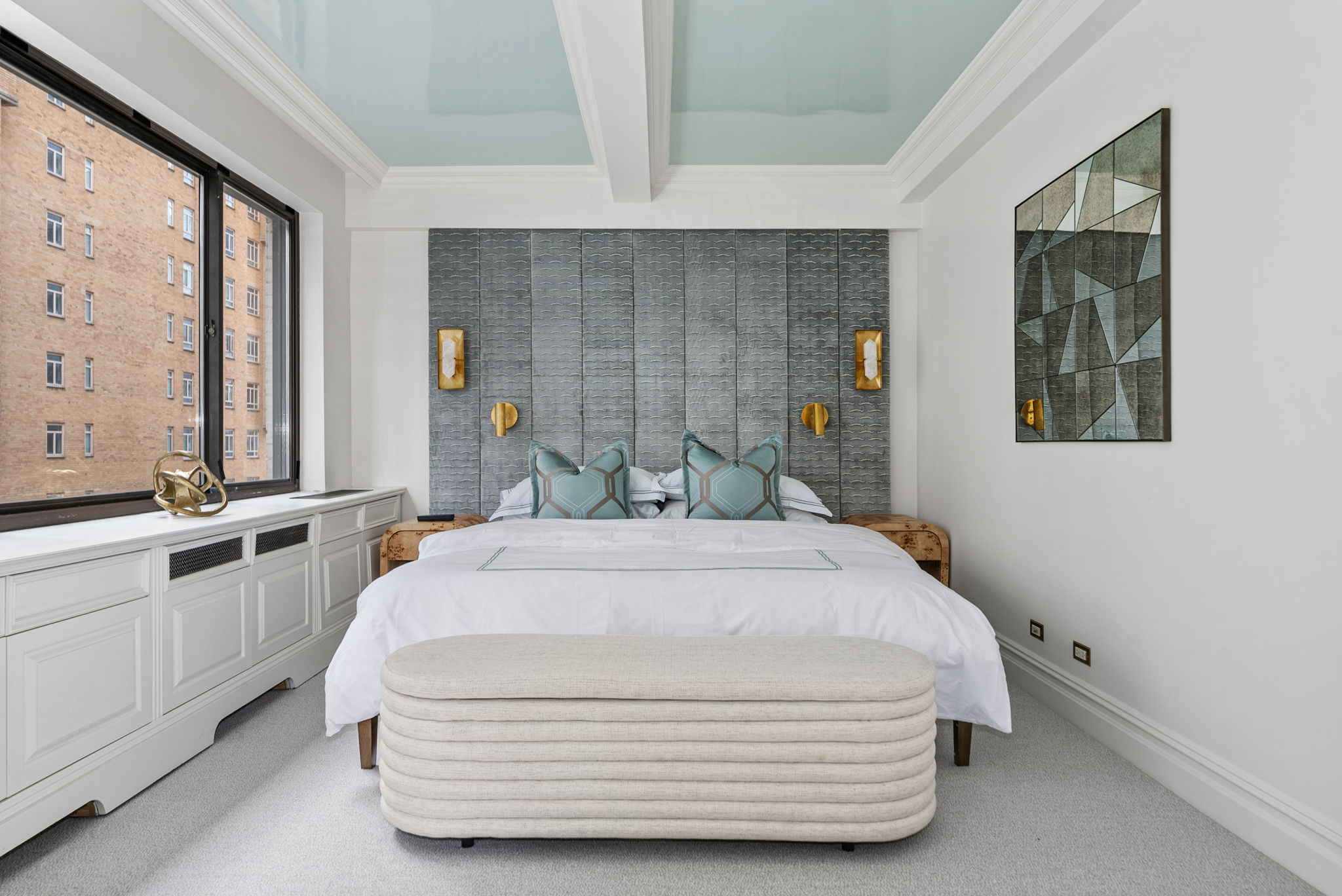 230 Central Park South, Unit 6DE Manhattan, NY 10019 - Photo 11 of 23 a spacious bedroom with a bed a window and painting on the wall