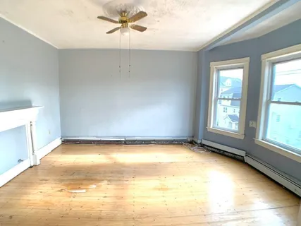 a view of an empty room and window