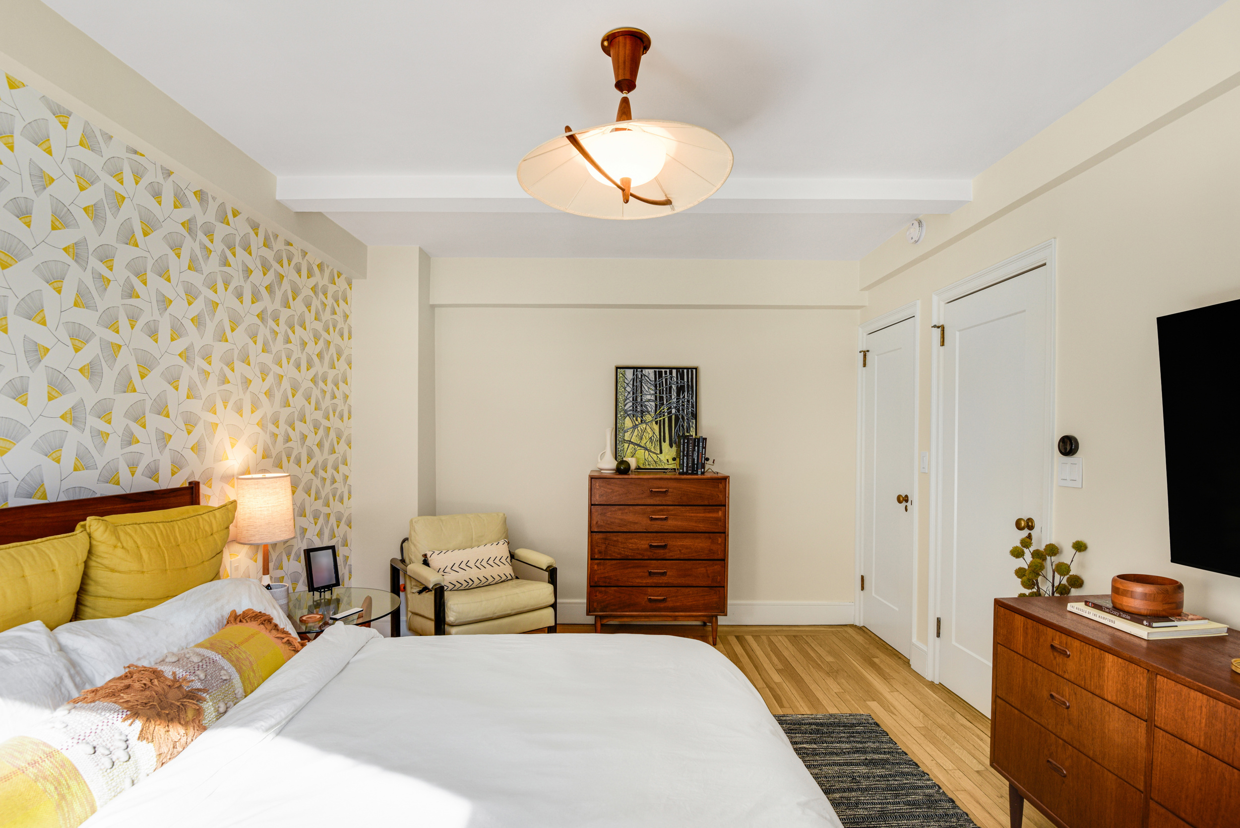 205 East 78th Street, Unit 7K Manhattan, NY 10075 - Photo 10 of 14 a bedroom with a bed and furniture