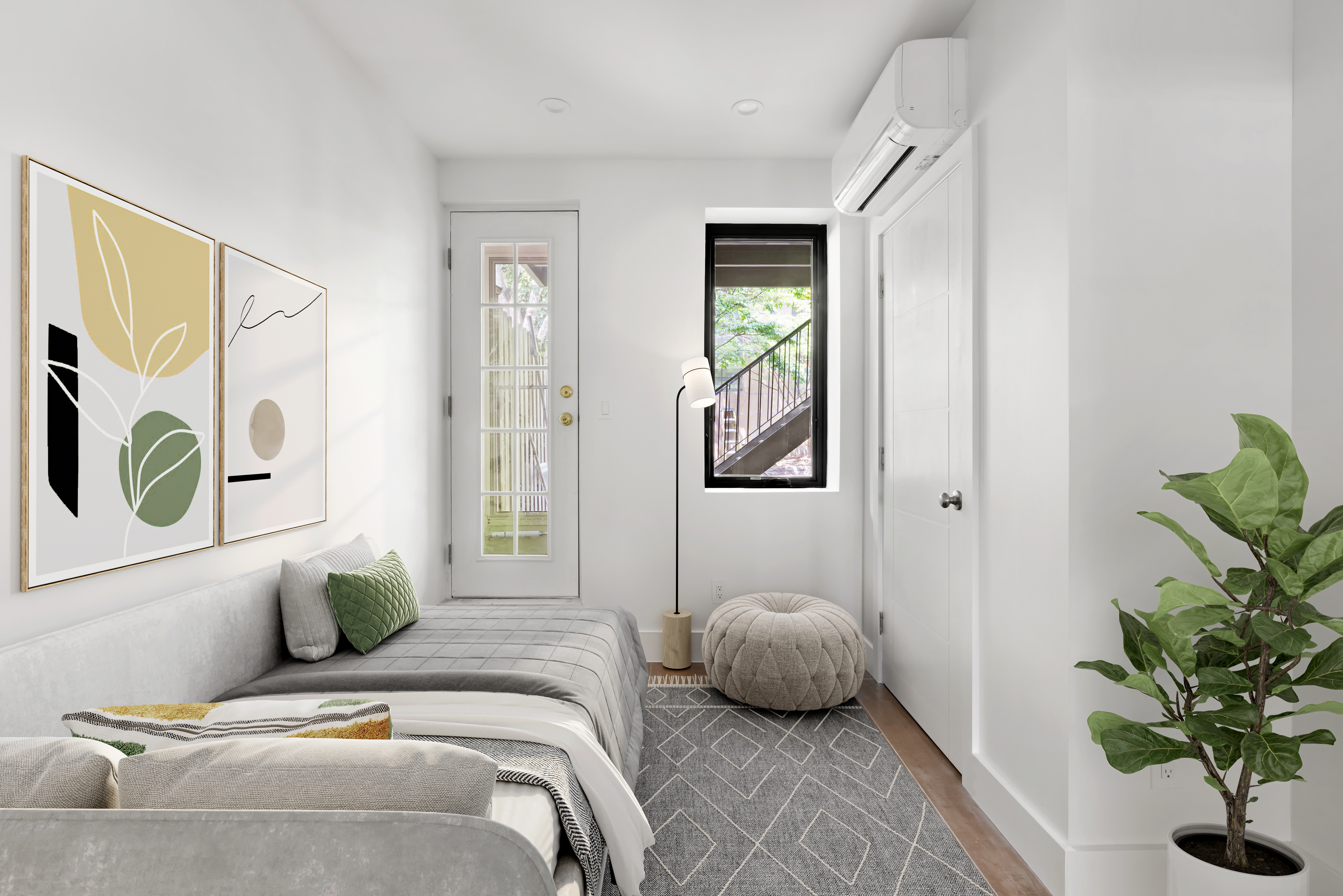 45-08 11th Street, Unit GARDEN Queens, NY 11101 - Photo 5 of 9 a bedroom with a bed and a potted plant