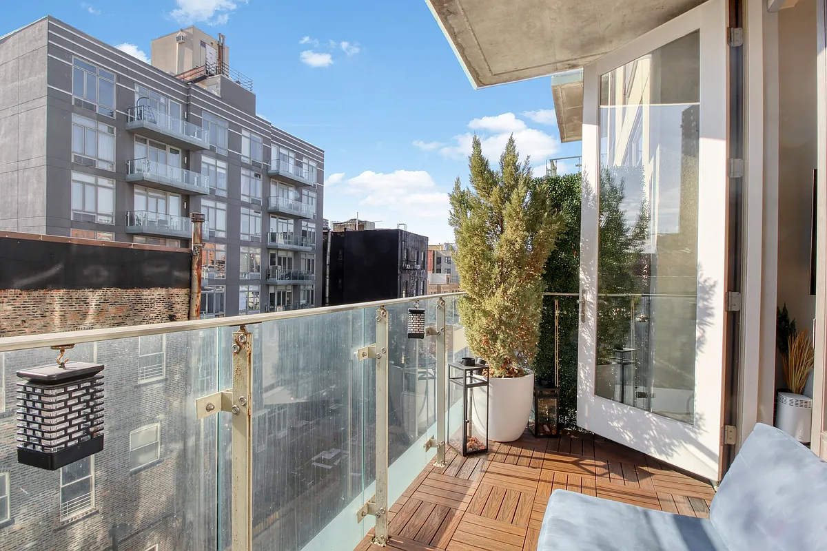 342 East 110th Street, Unit 5E Manhattan, NY 10029 - Photo 2 of 18 a view of a building from a building