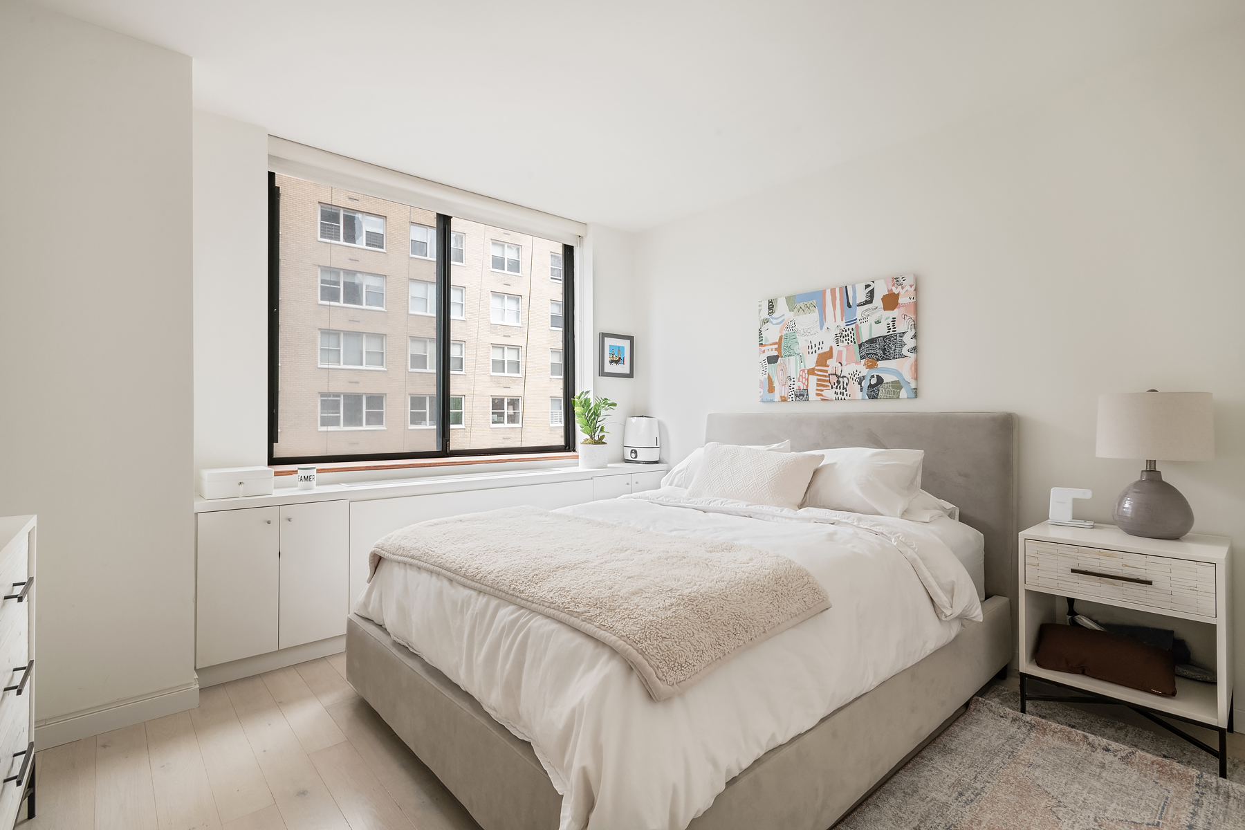 330 East 75th Street, Unit 3L Manhattan, NY 10021 - Photo 5 of 14 a bedroom with a bed and a window