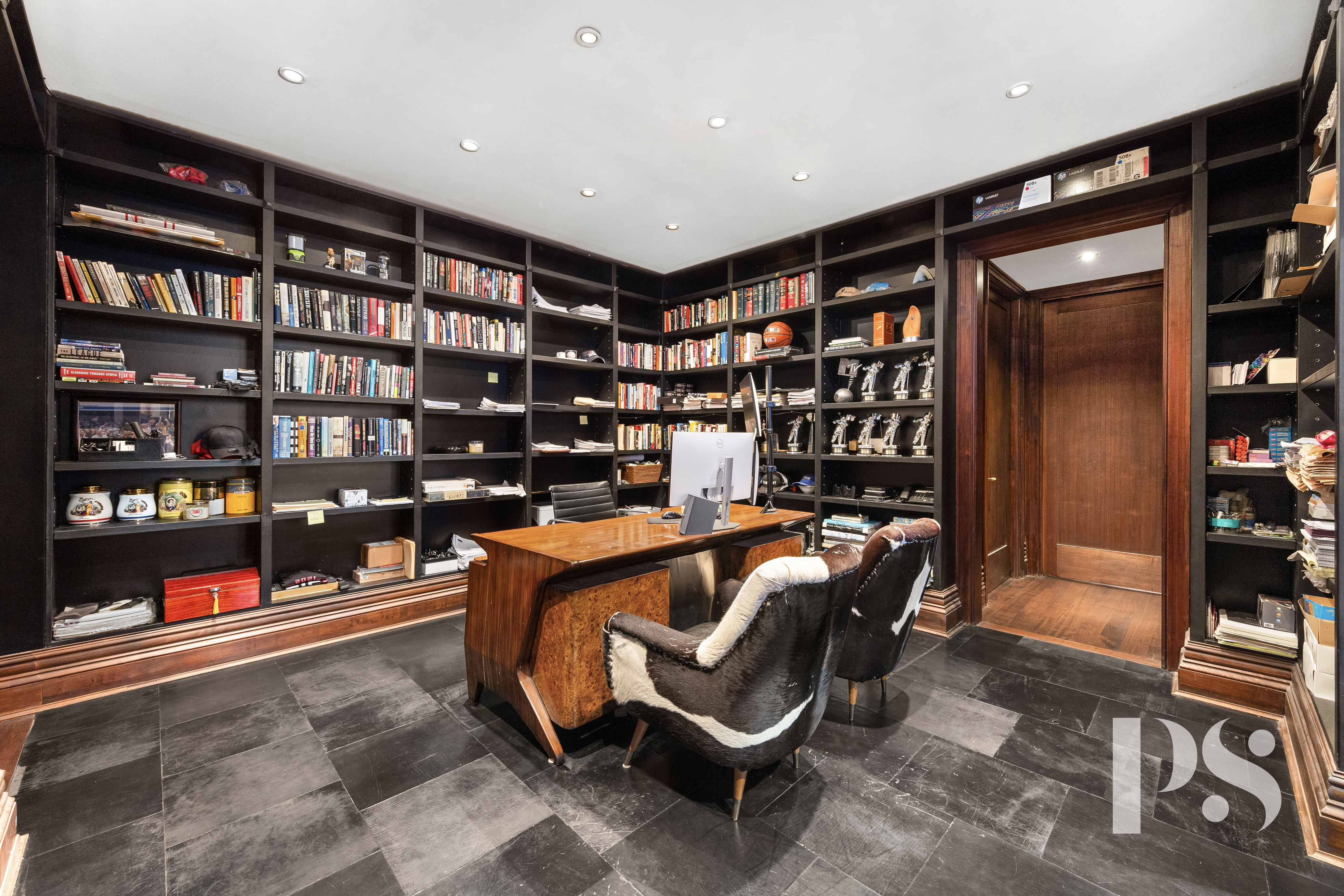 644 Broadway, Unit 2E Manhattan, NY 10012 - Photo 6 of 18 a reading room with furniture and book shelf