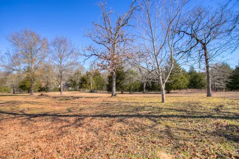 a view of a house with snow on the floor